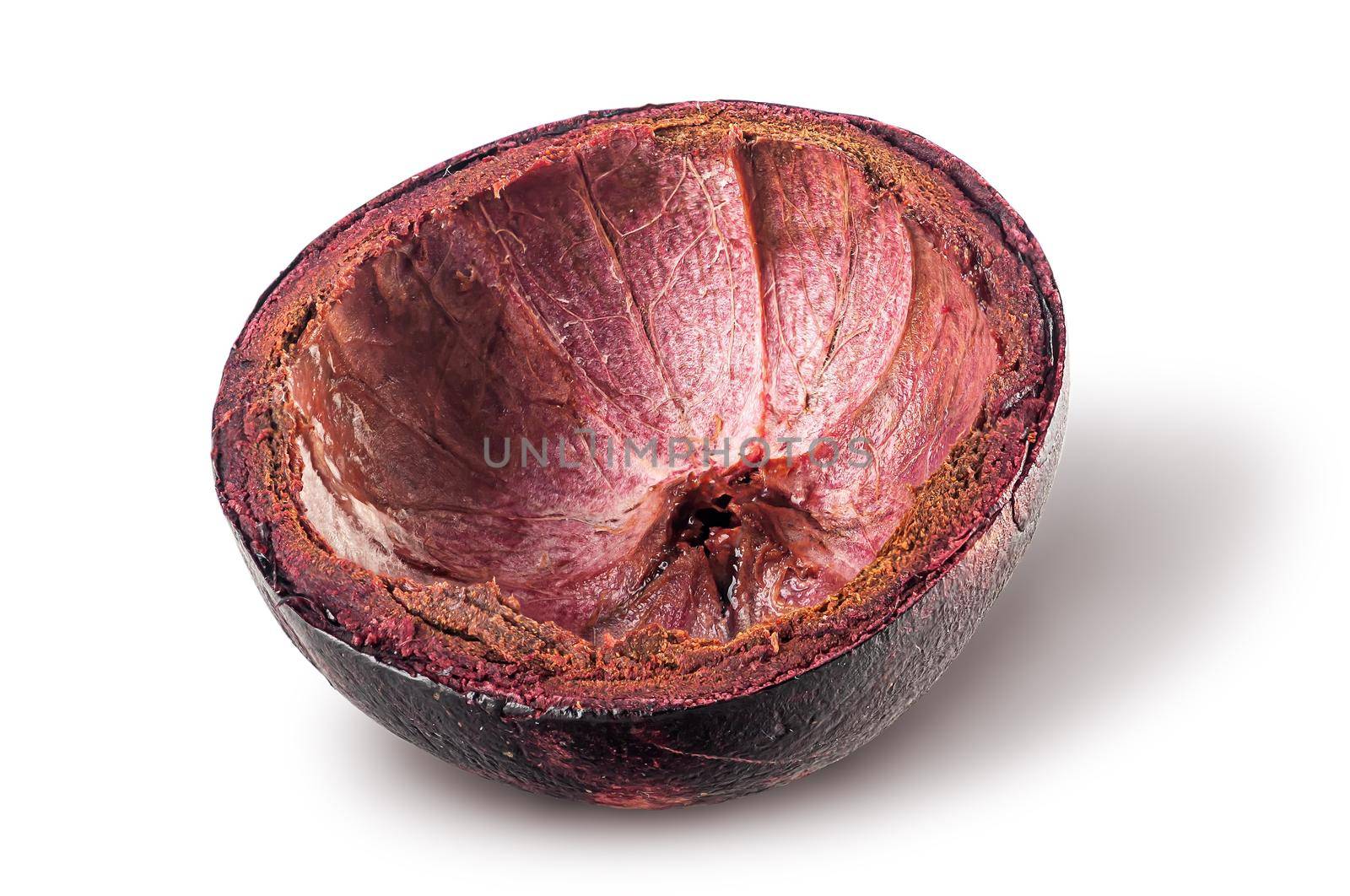 Dark purple mangosteen shell isolated on white background