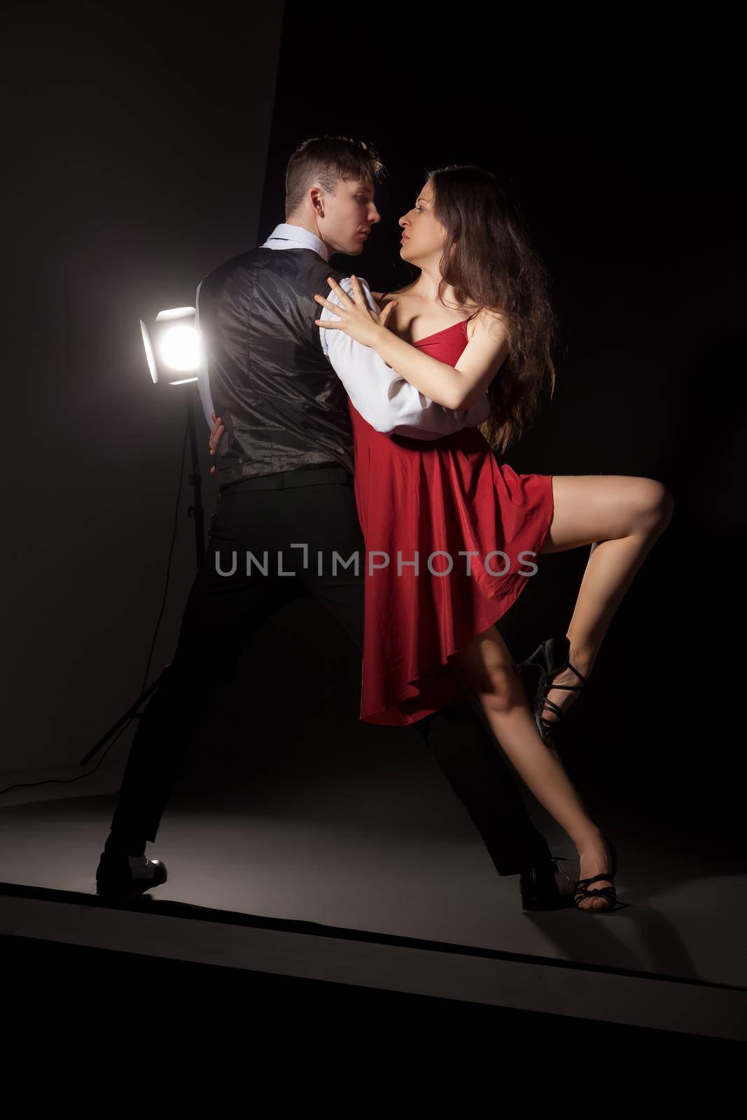 Man and woman in the most romantic dance tango by Julenochek