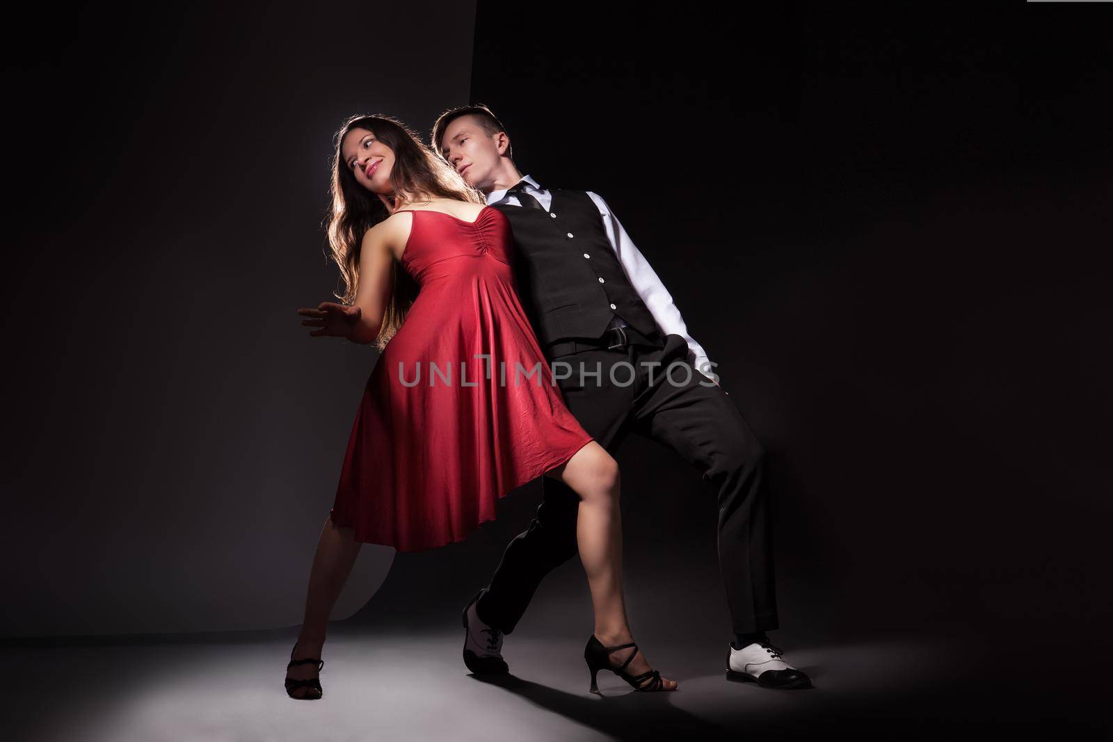 Man and woman in the most romantic dance tango by Julenochek
