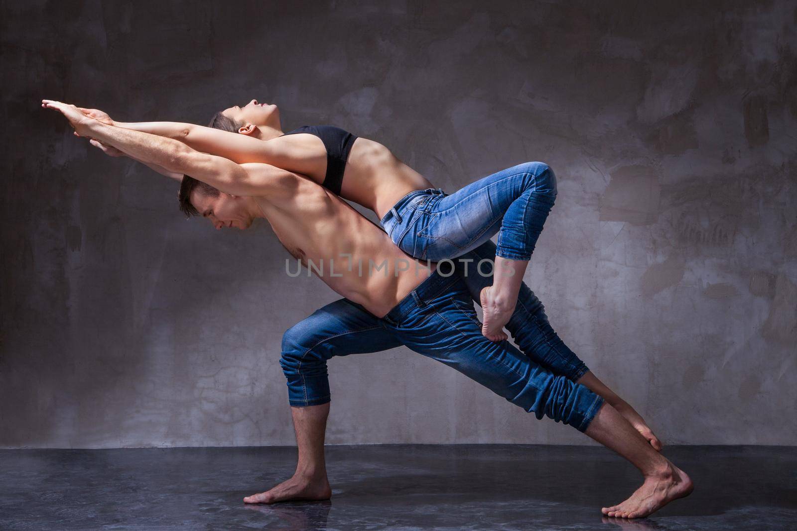 Man and woman in passionate dance pose by Julenochek
