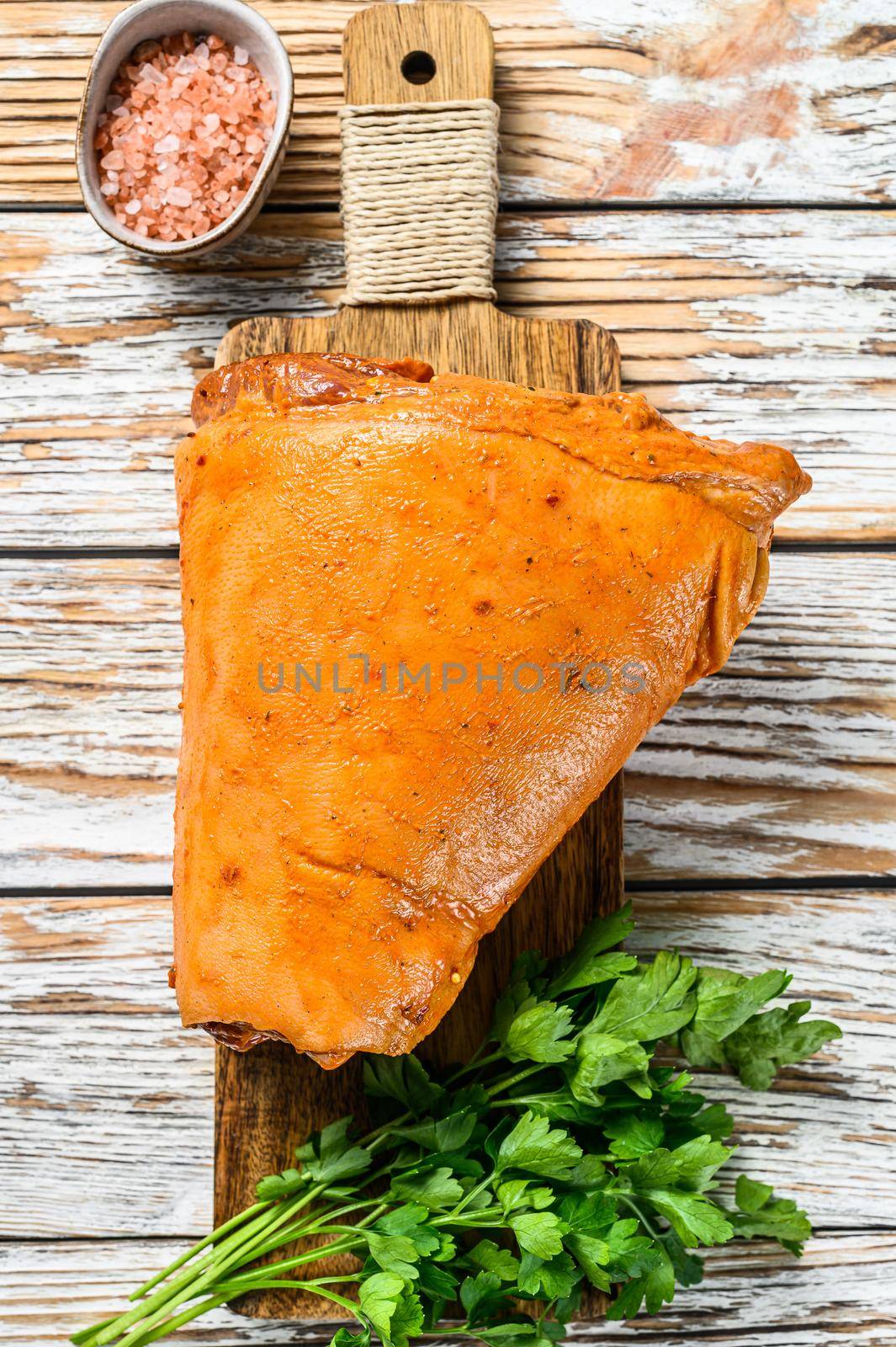 Raw fat pork knee ready for cooking. White background. Top view.