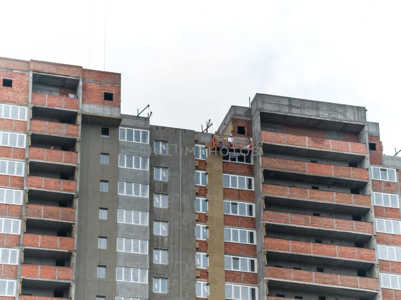 scaffolding on a building wall. building getting a new paint.