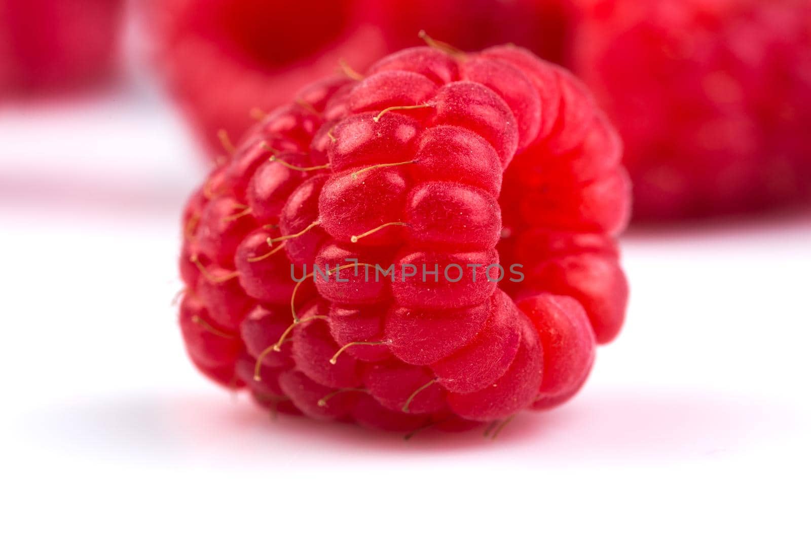 Fresh raspberry isolated on a white background