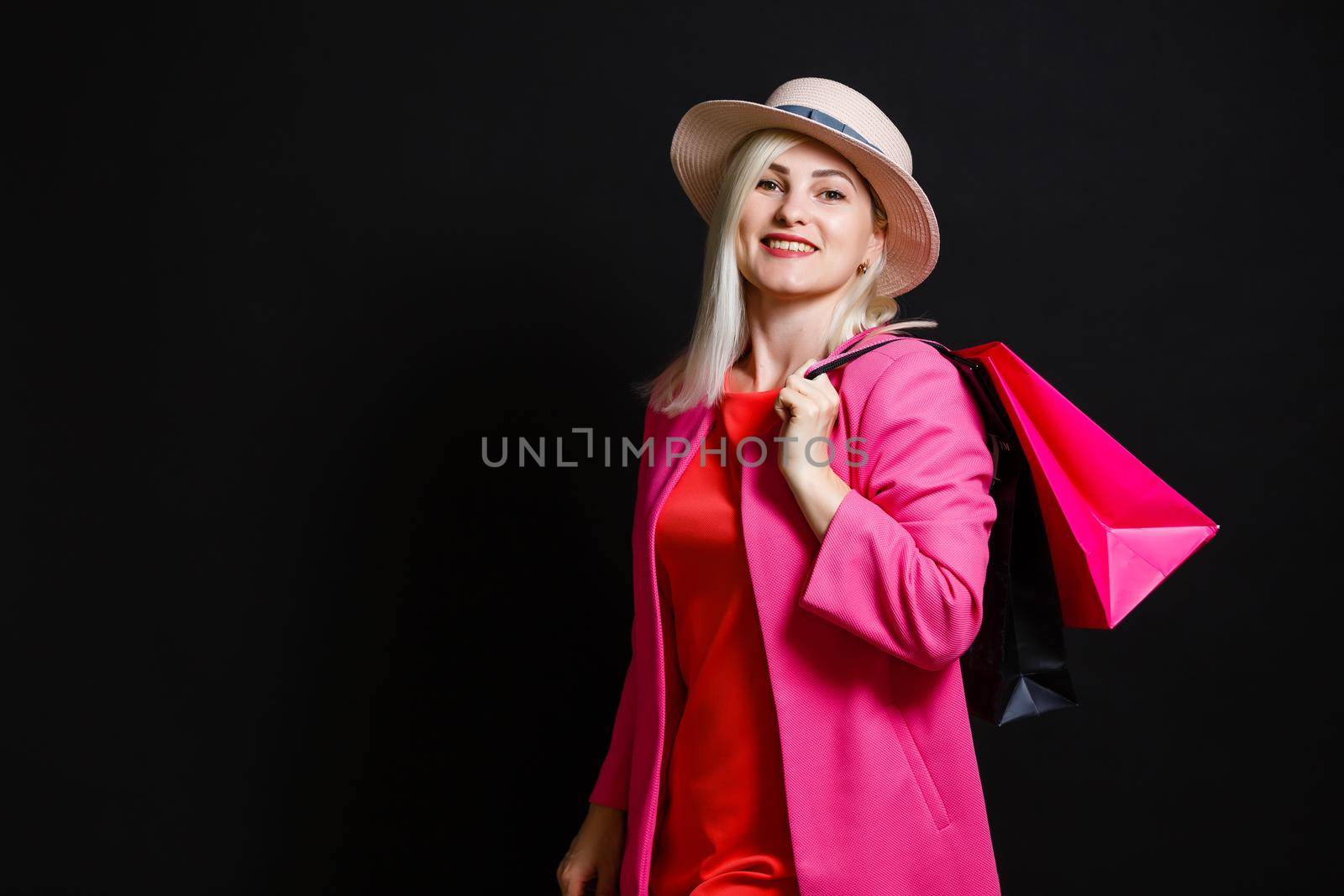 woman with shopping bags on black friday