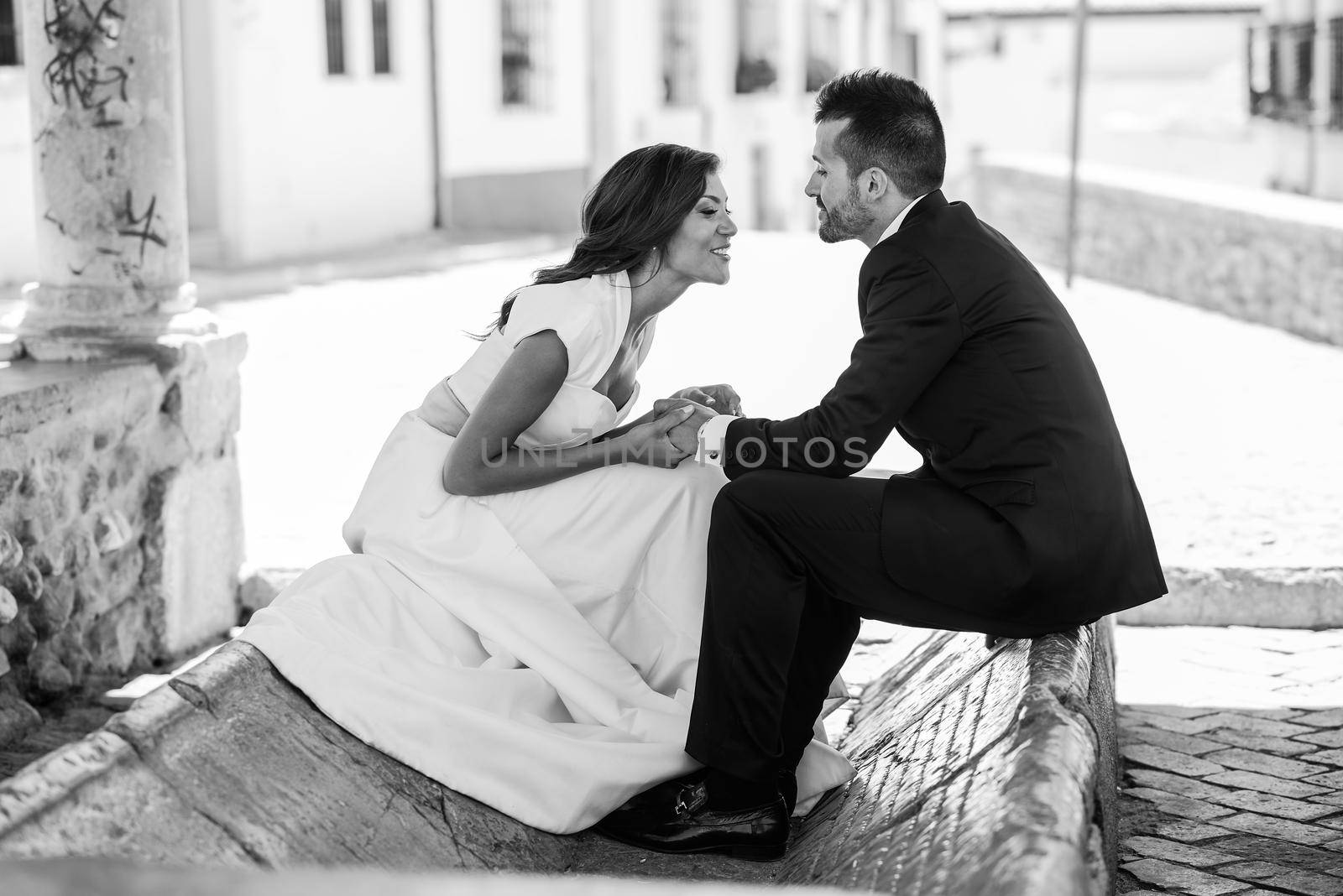 Just married couple together in urban background