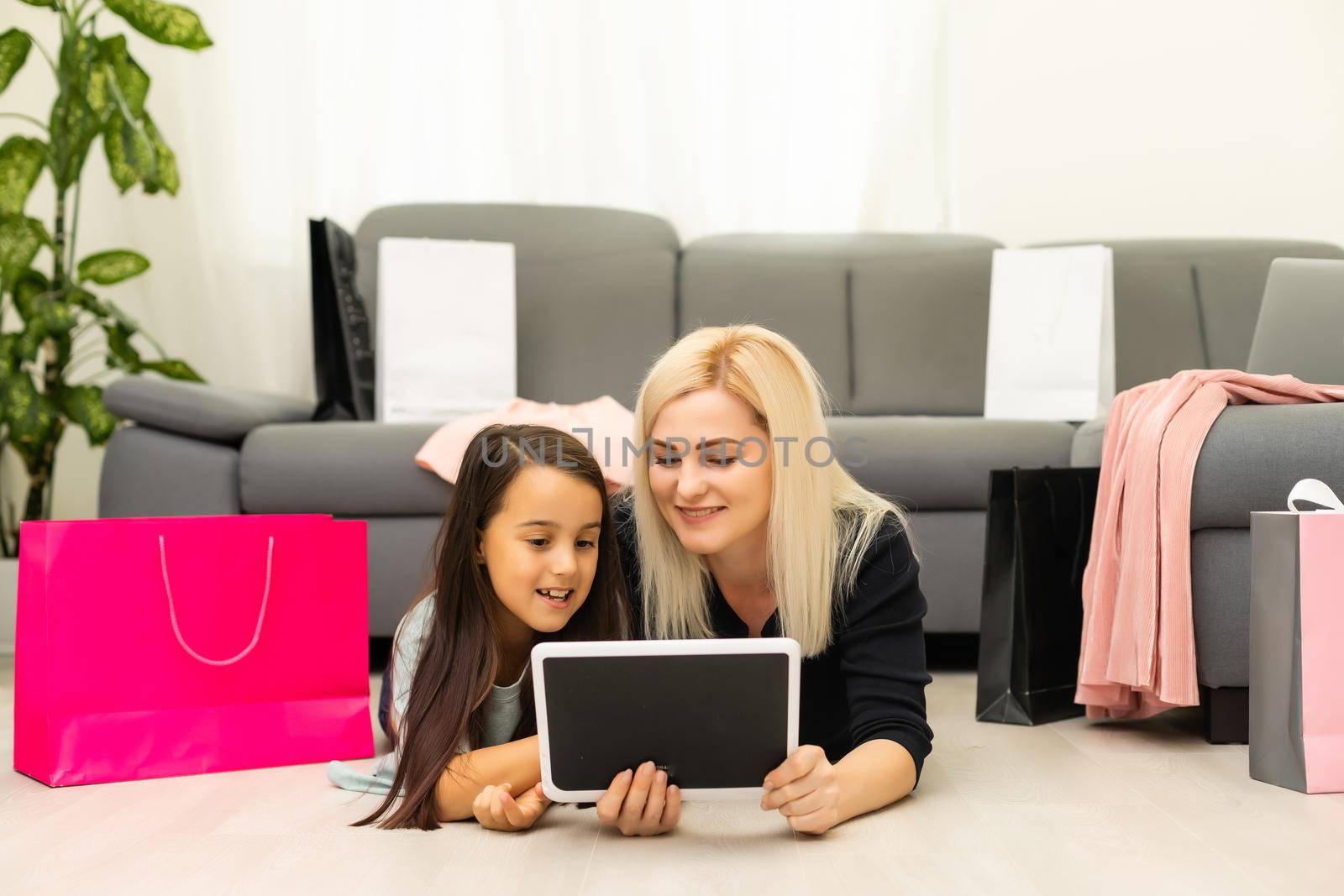 Mother and daughter shopping on internet