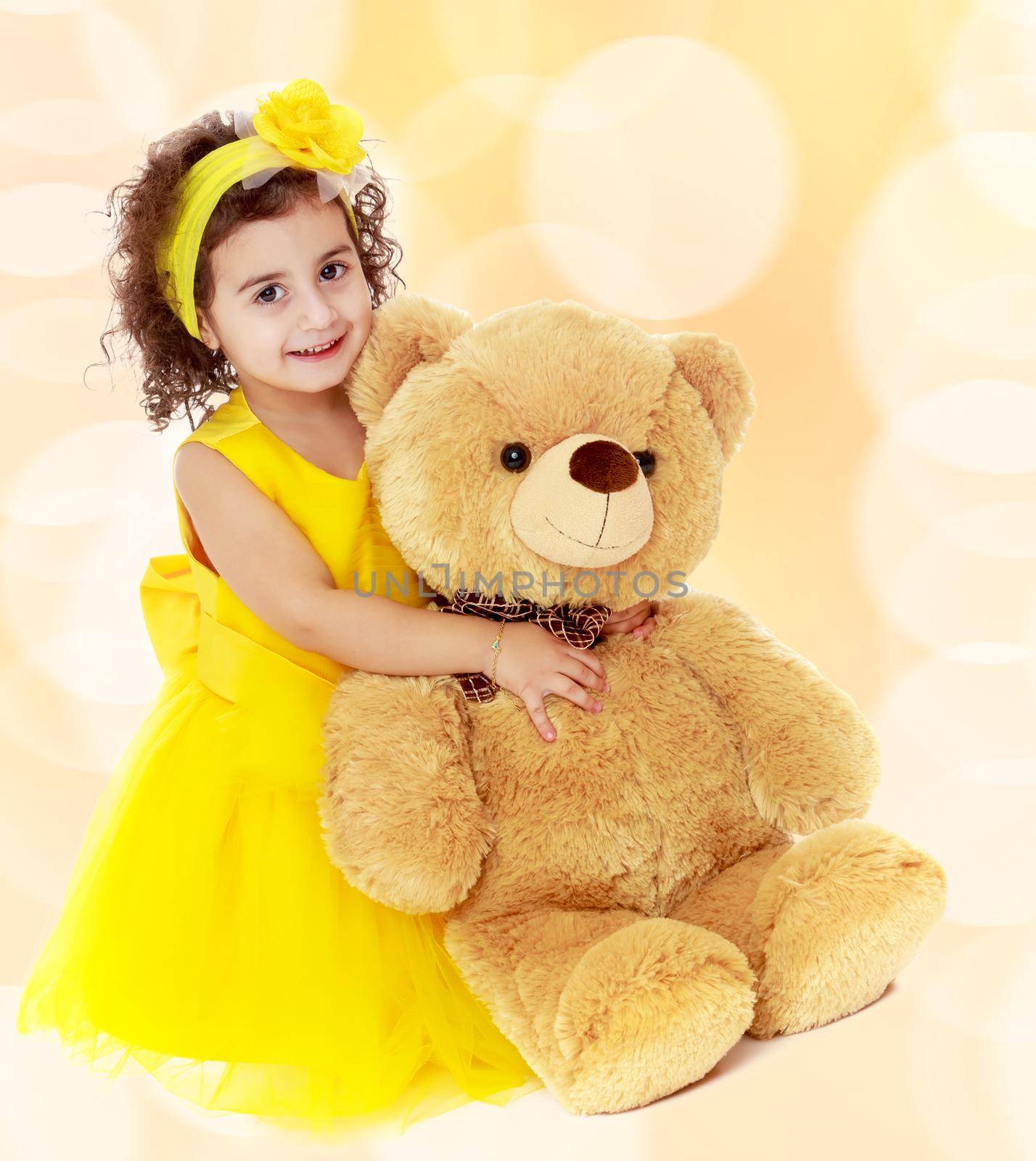 Little girl hugging Teddy bear by kolesnikov_studio