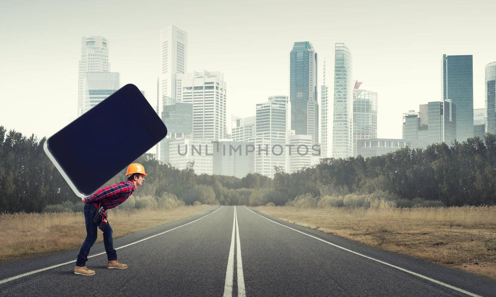 Man engineer carrying on back big smartphone