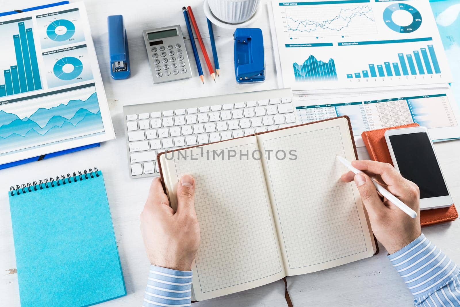 close-up of hands with notepad. office work