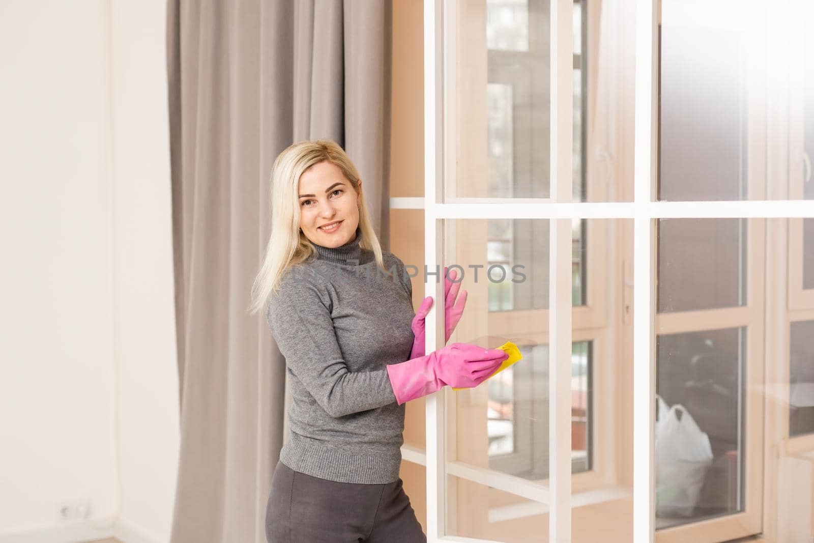 Young housewife is ready for cleaning.