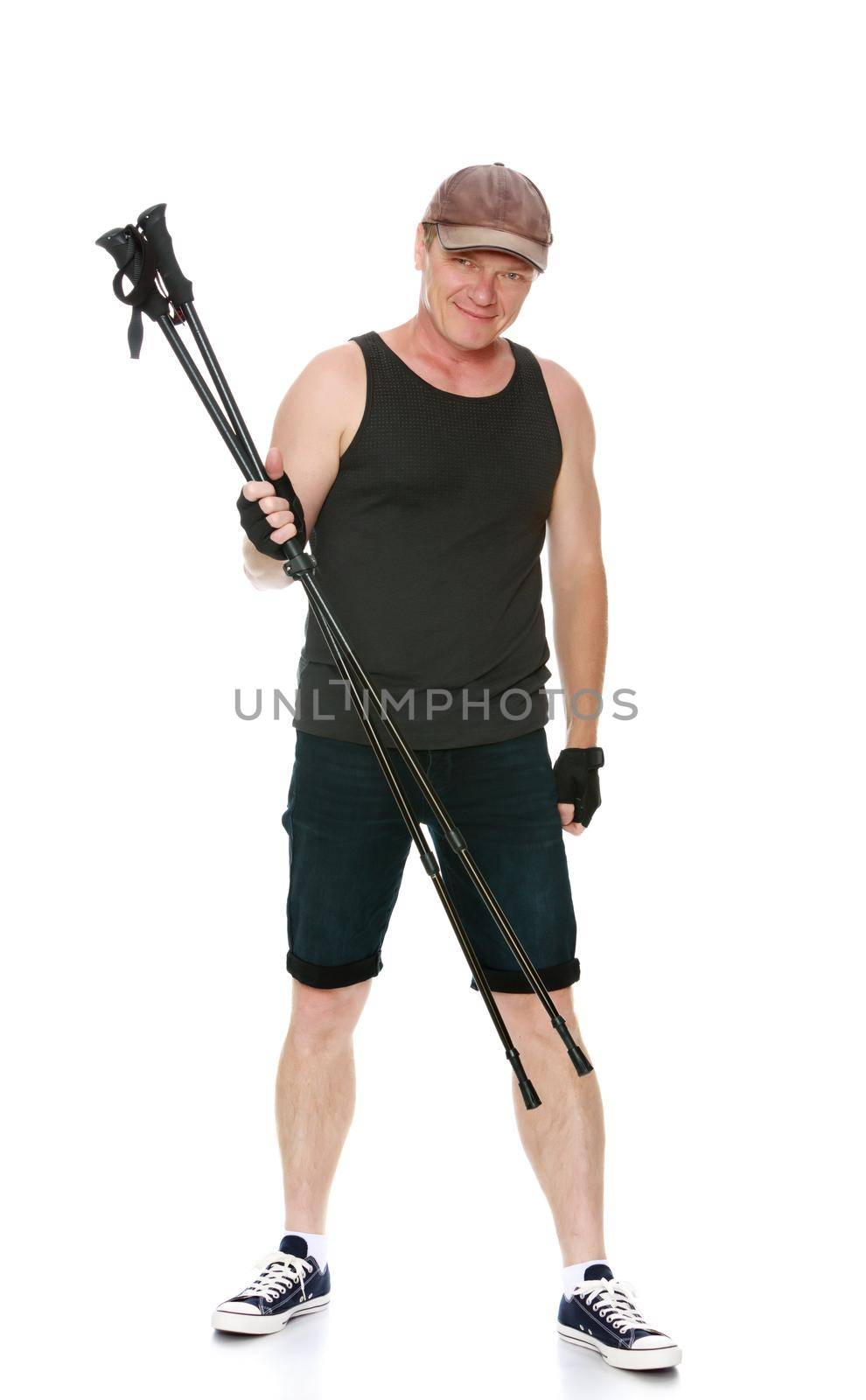 The concept of sports lifestyle and maintenance of health in adulthood. Fifty-year-old man, engaged in Nordic walking with special poles. Isolated on white background