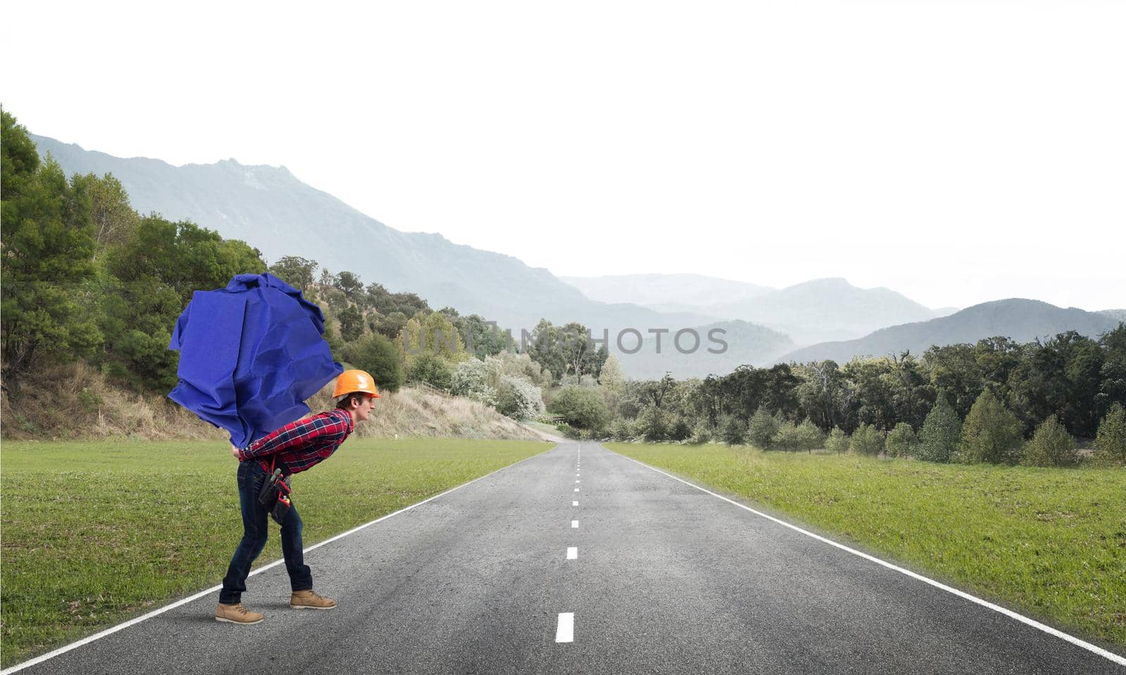 Builder man carrying paper ball on his back
