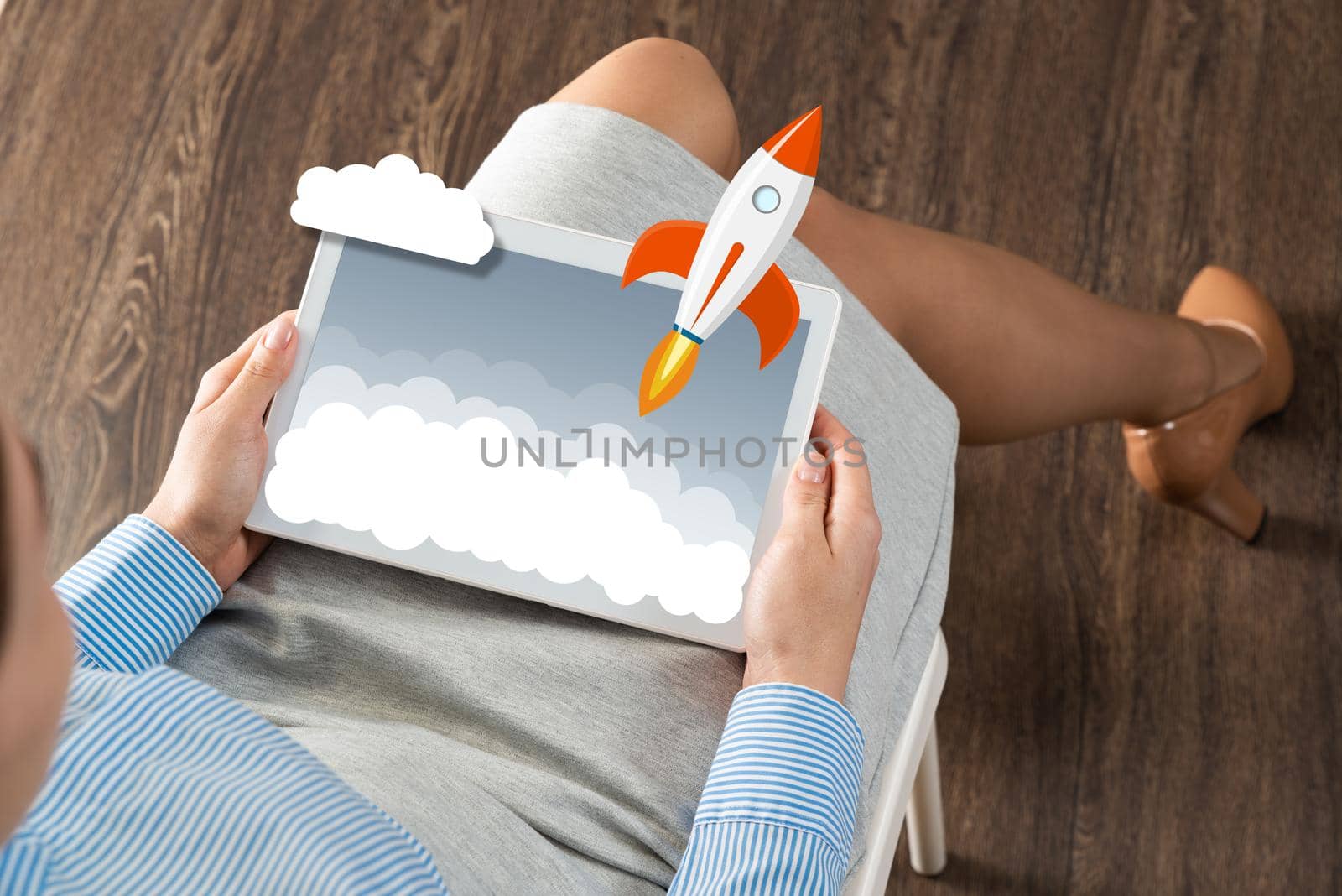 close-up of female hands with a computer tablet. Concept business startup