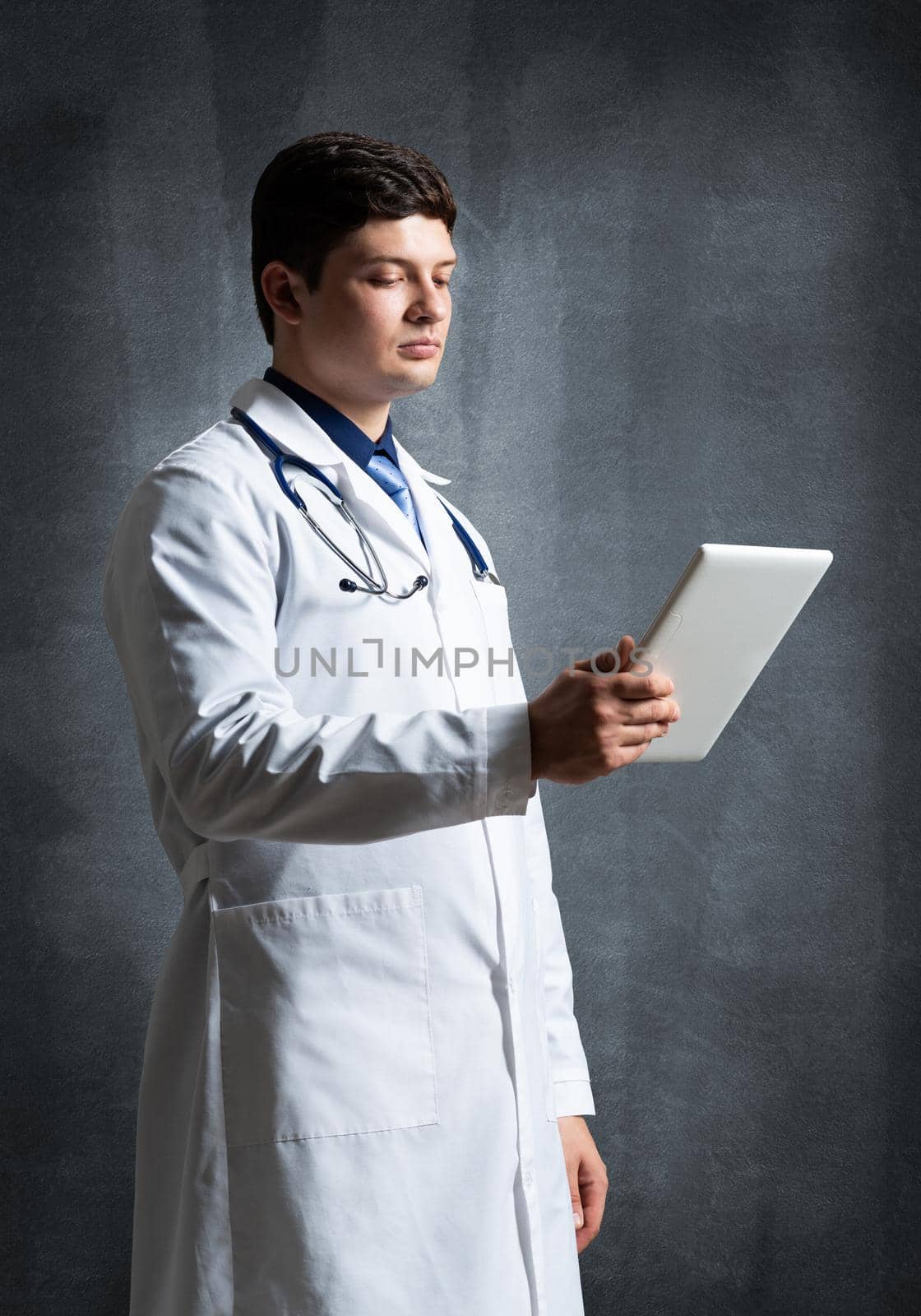 Doctor with a computer tablet by adam121