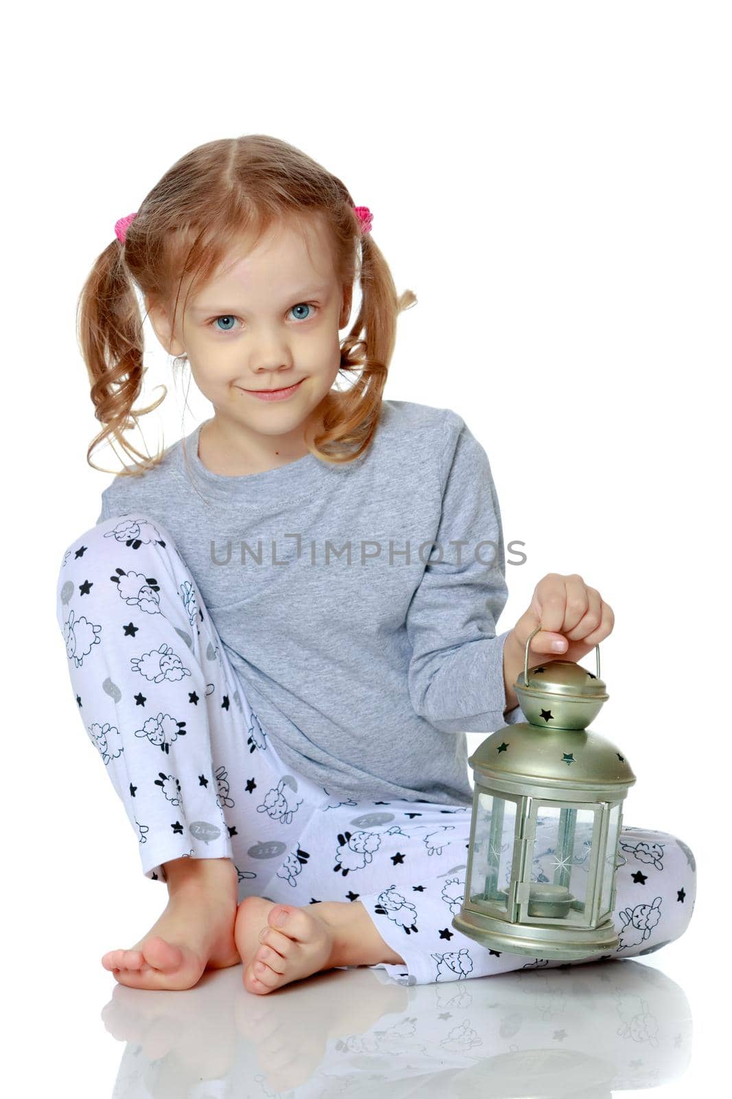 Little girl in pajamas. by kolesnikov_studio