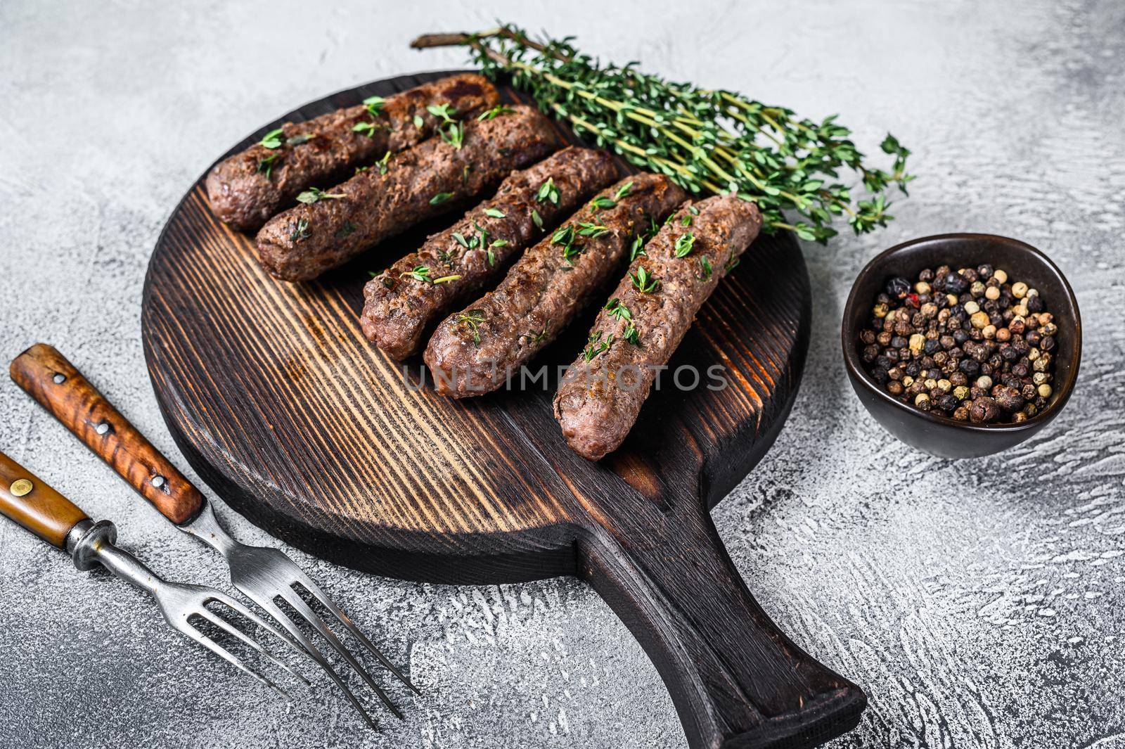 Roast Shish kebab lamb meat sausages. White background. Top view.
