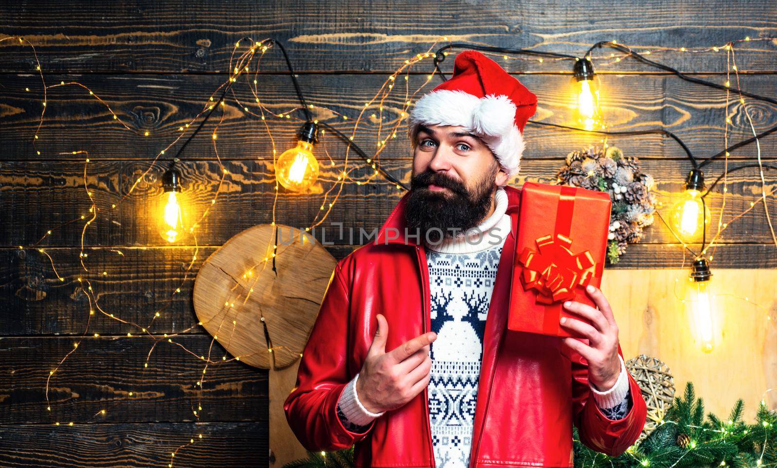 Santa Claus gifting gift. Hipster santa claus. Santa in home. Merry christmas and Happy new year. by Tverdokhlib