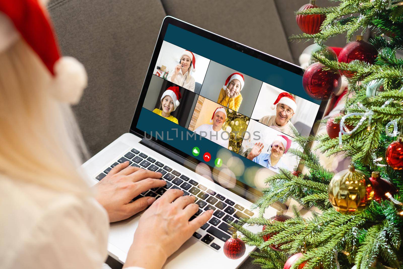 Attractive happy young girl student having video chat, waving. christmas by Andelov13