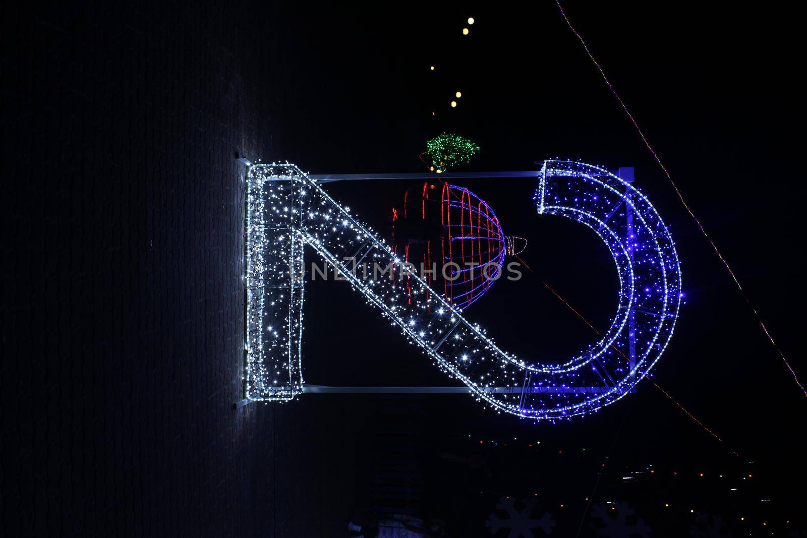 Number 2 two blue white and garlands of lighting. New Year Christmas Illumination Symbol of the Year Date by Shoba