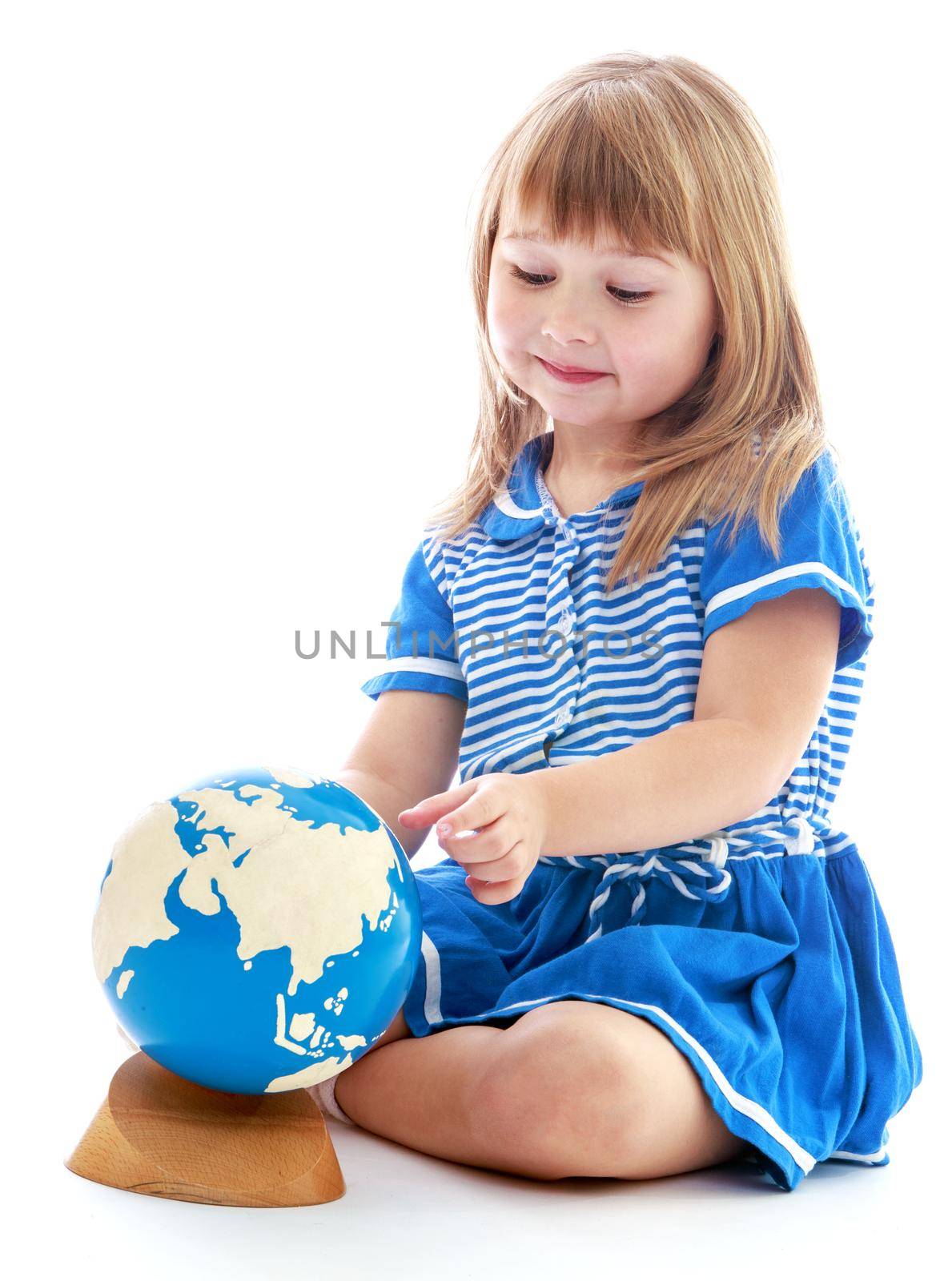 Girl with globe on white background.Happy childhood, adolescence, the development of the family concept.