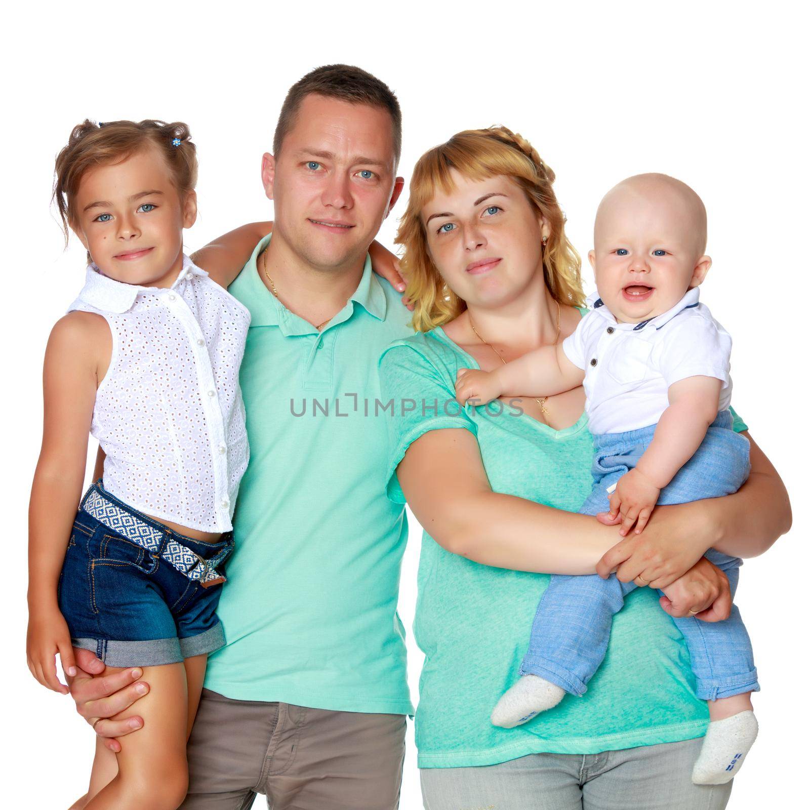 Happy family with young children. The concept of family happiness and development of children. Isolated on white background.