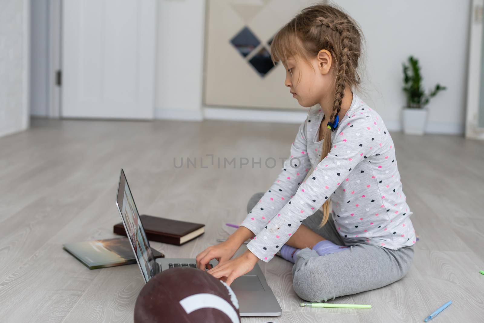 Little girl Hands using laptop. Online shopping in childhood. by Andelov13