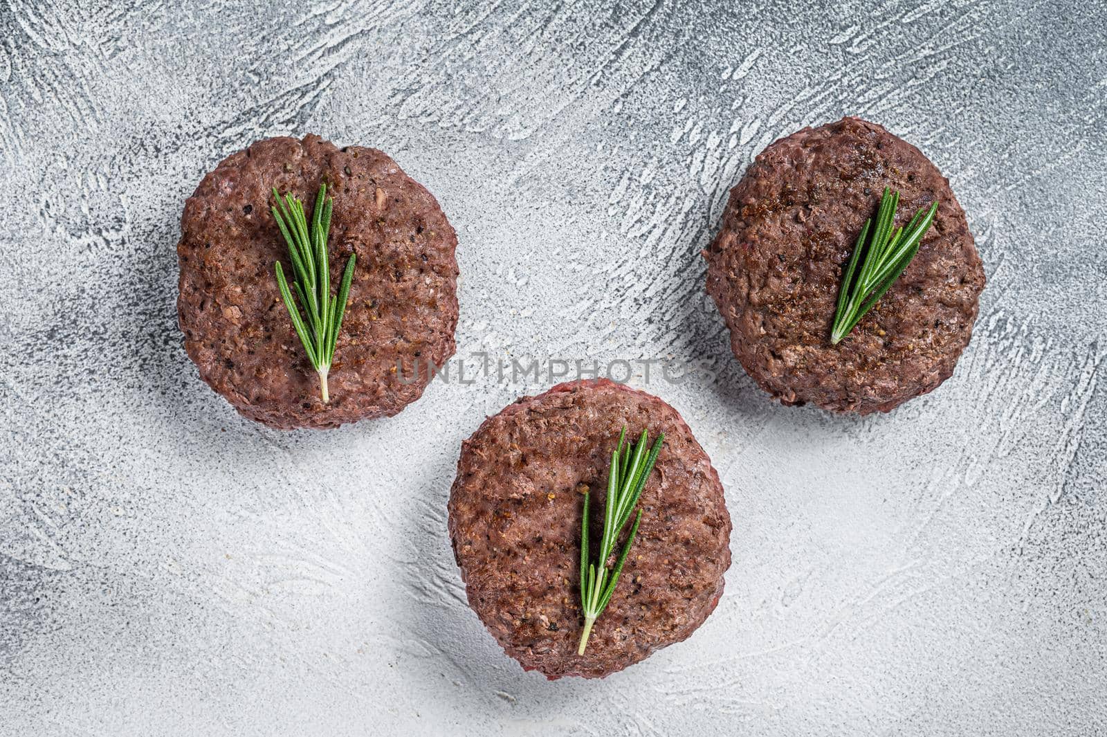 Grilled hamburger meat cutlets patties. White background. Top view.