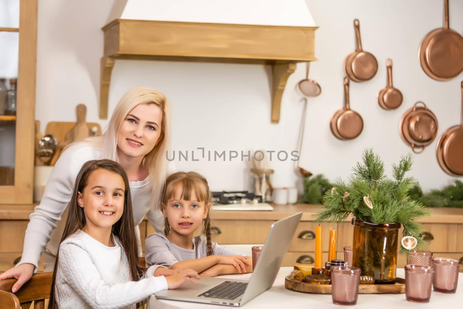 Young elementary school girl watching online education class. Coronavirus or Covid-19 lockdown education concept. by Andelov13