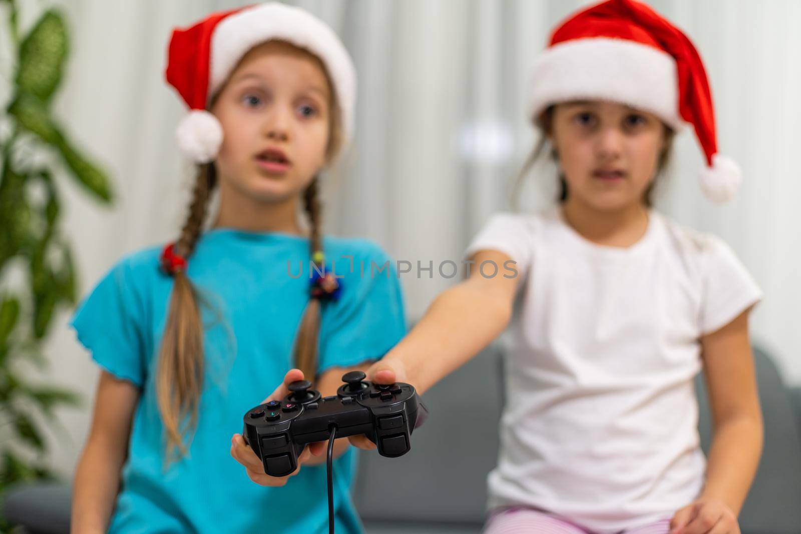 Young girls with virtual reality glasses. VR headset.