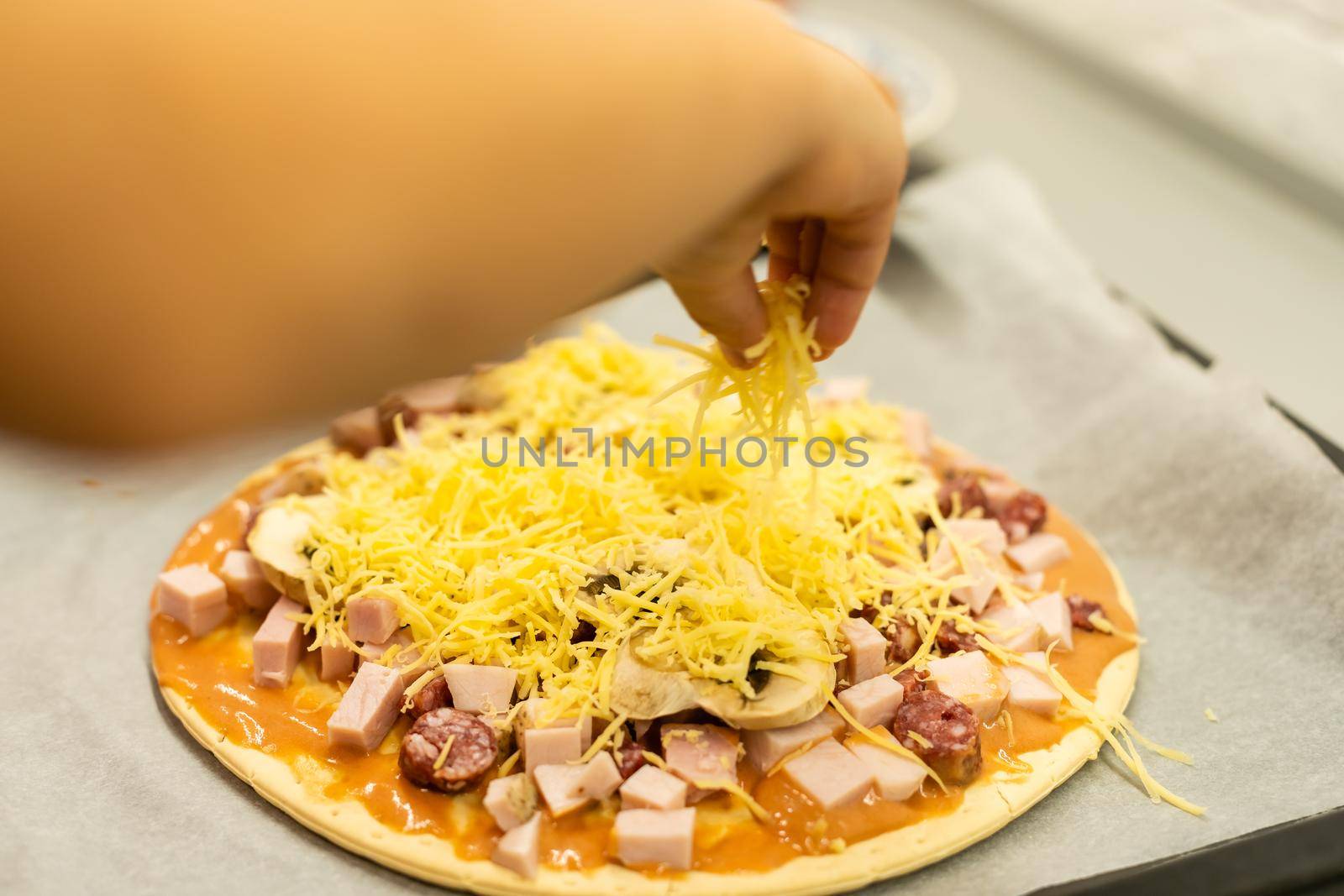 child cook homemade pizza, little girl makes pizza at home