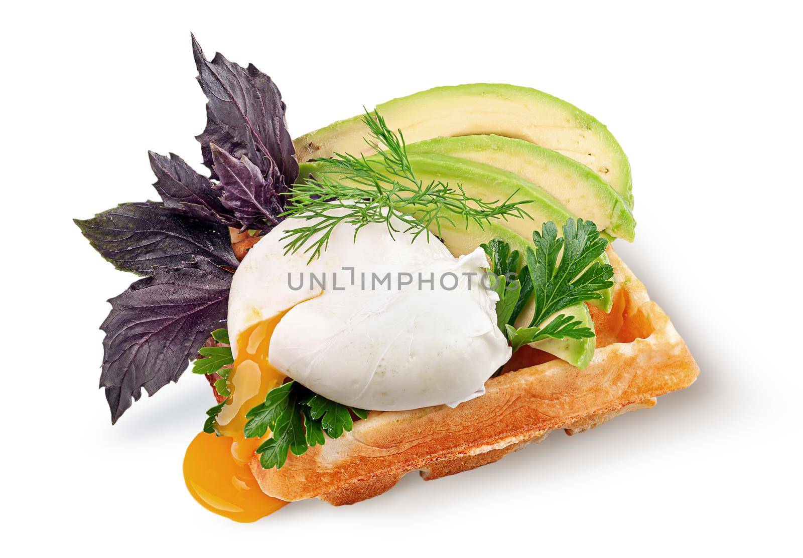 French waffle with poached egg and avocado isolated on white background