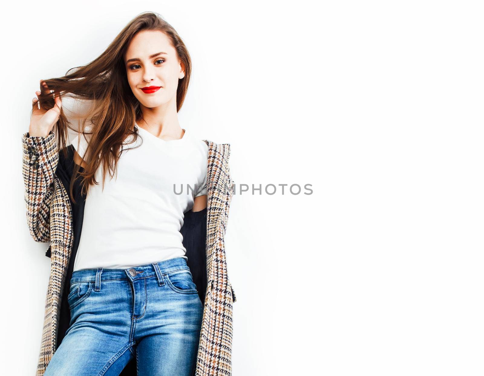 young pretty teenage hipster girl posing emotional happy smiling on white background, lifestyle people concept by JordanJ