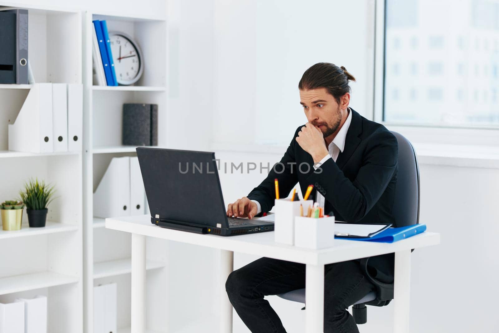 manager work in front of laptop emotions technology. High quality photo
