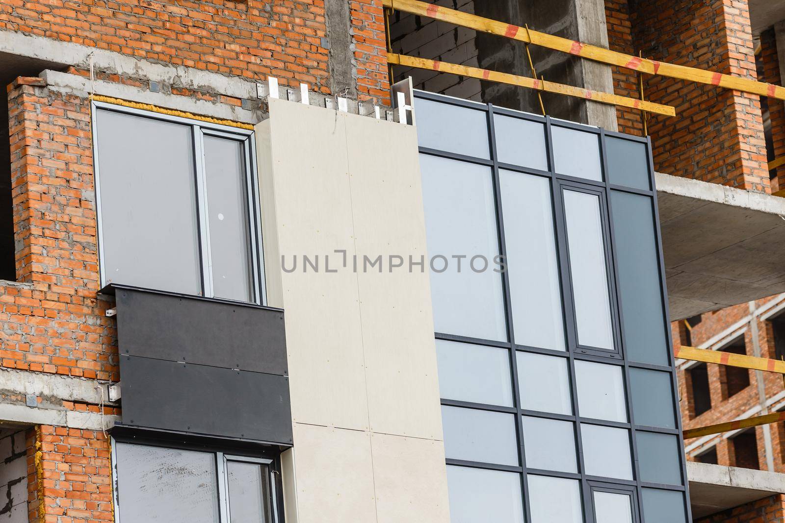 scaffolding on a building wall. building getting a new paint.