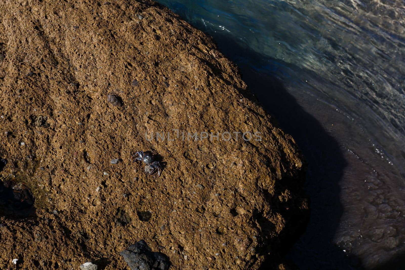 Calm ocean in the morning. ocean shore with stones.