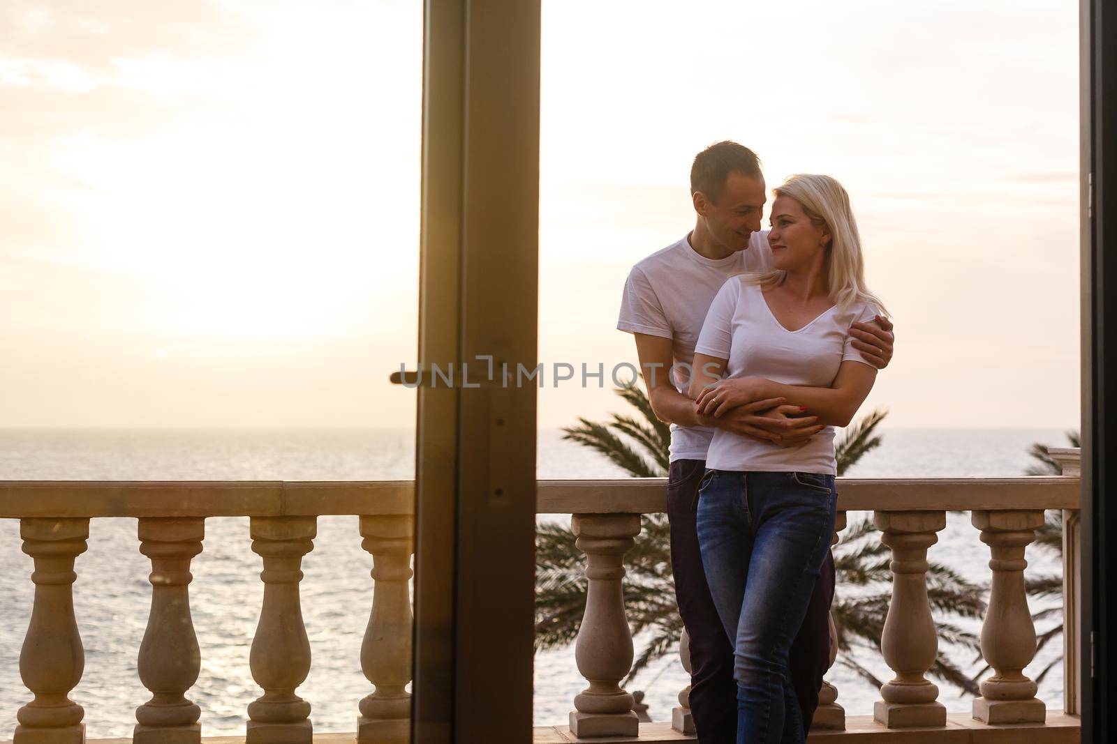 Happy woman looking on the ocean. Resort.