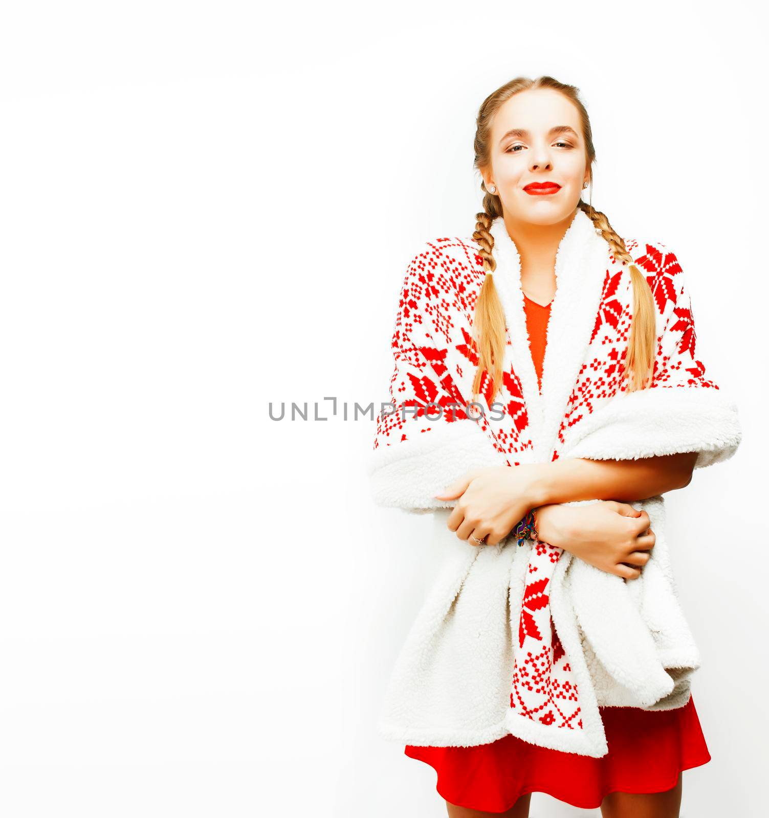 young pretty happy smiling woman on christmas in santas red hat posing isolated on white background, lifestyle people concept closeup