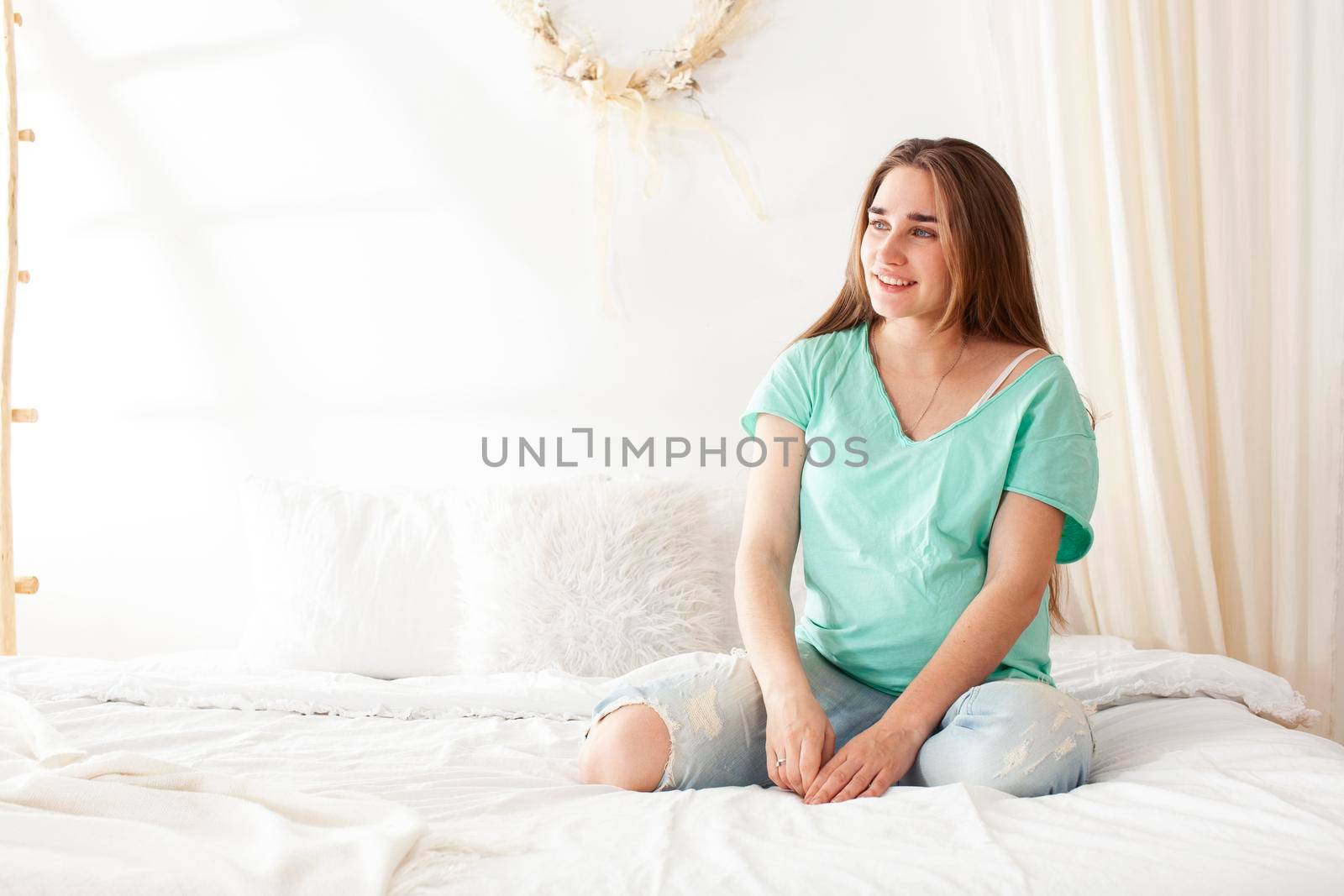 young pretty caucasian pregnant woman posing cheerful at home, lifestyle people concept close up