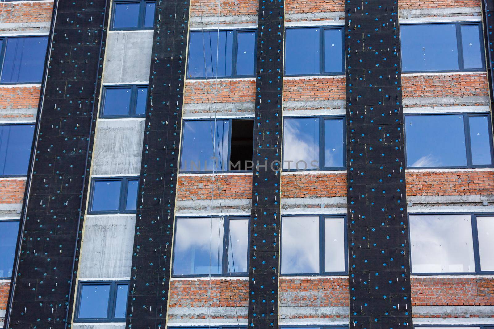 scaffolding on a building wall. building getting a new paint.