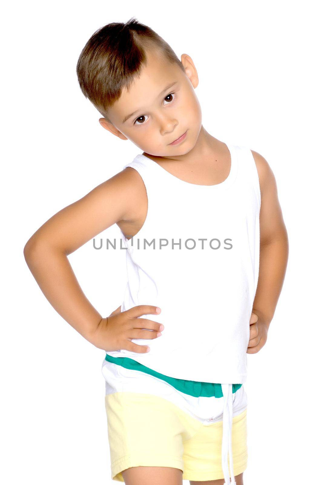 A cute little boy in a white T-shirt. The concept of promotional goods, inscriptions and drawings on clothes. Isolated on white background.