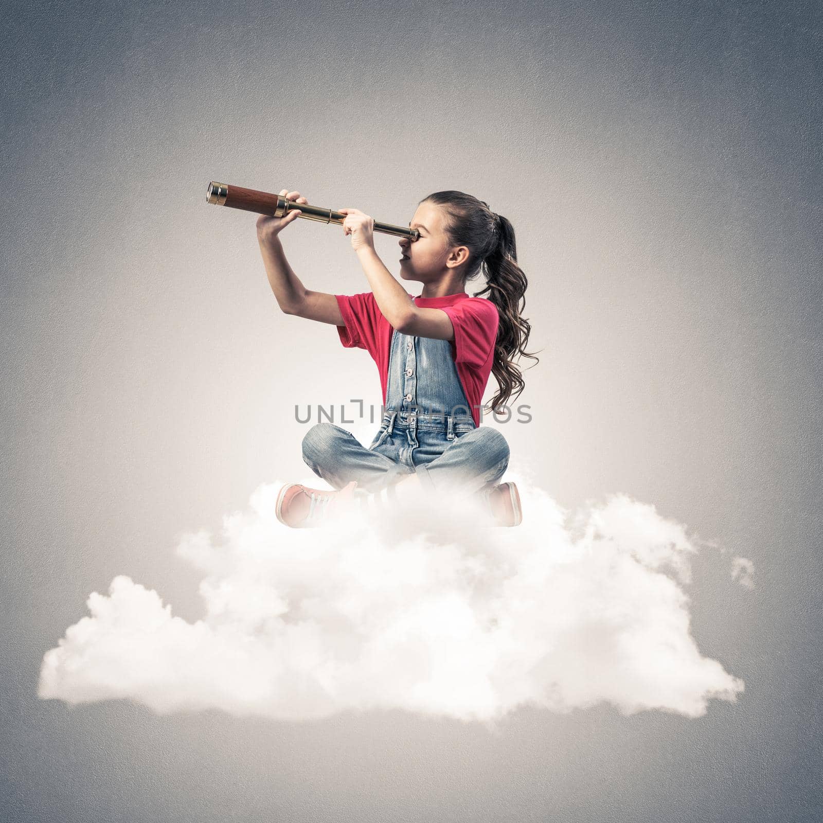 Cute kid girl on cloud looking in spyglass