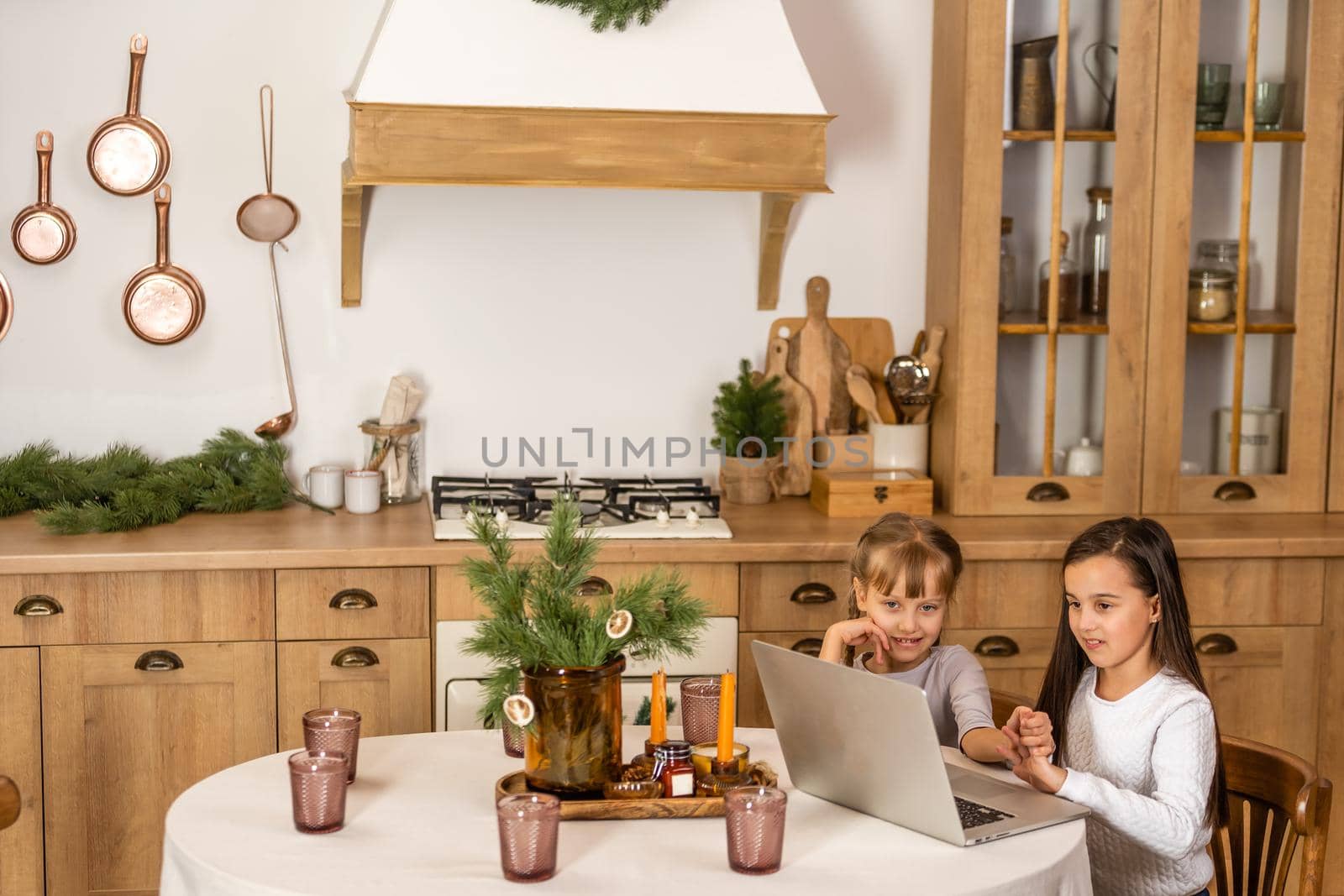 two little girls with family online during COVID19 outbreak