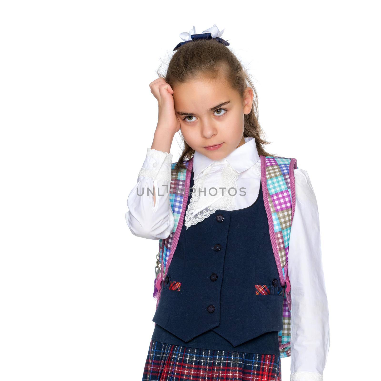 Beautiful little girl goes to school. The concept of a happy childhood, education and culture. Isolated on white background.