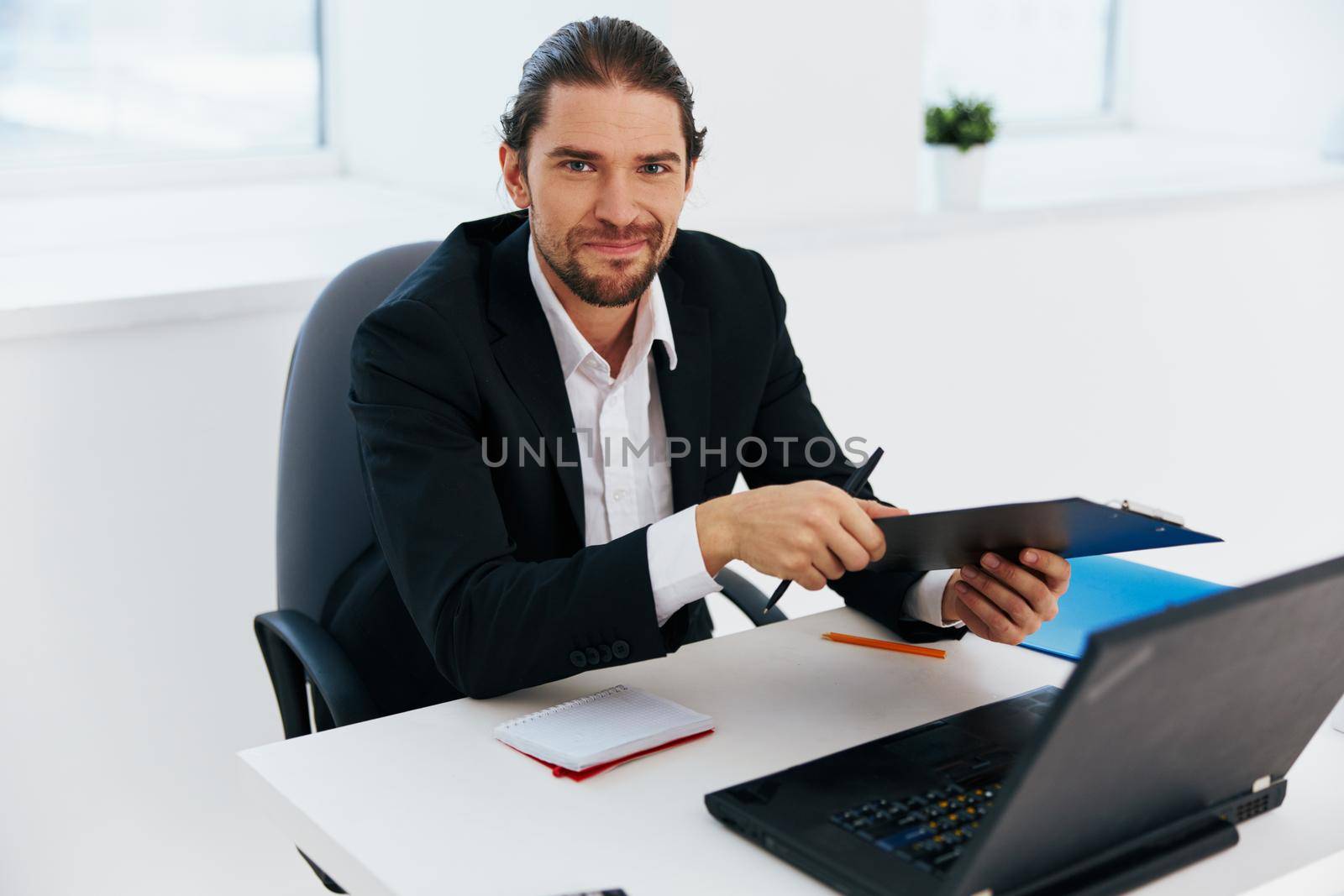 Man emotions work office desk technology. High quality photo