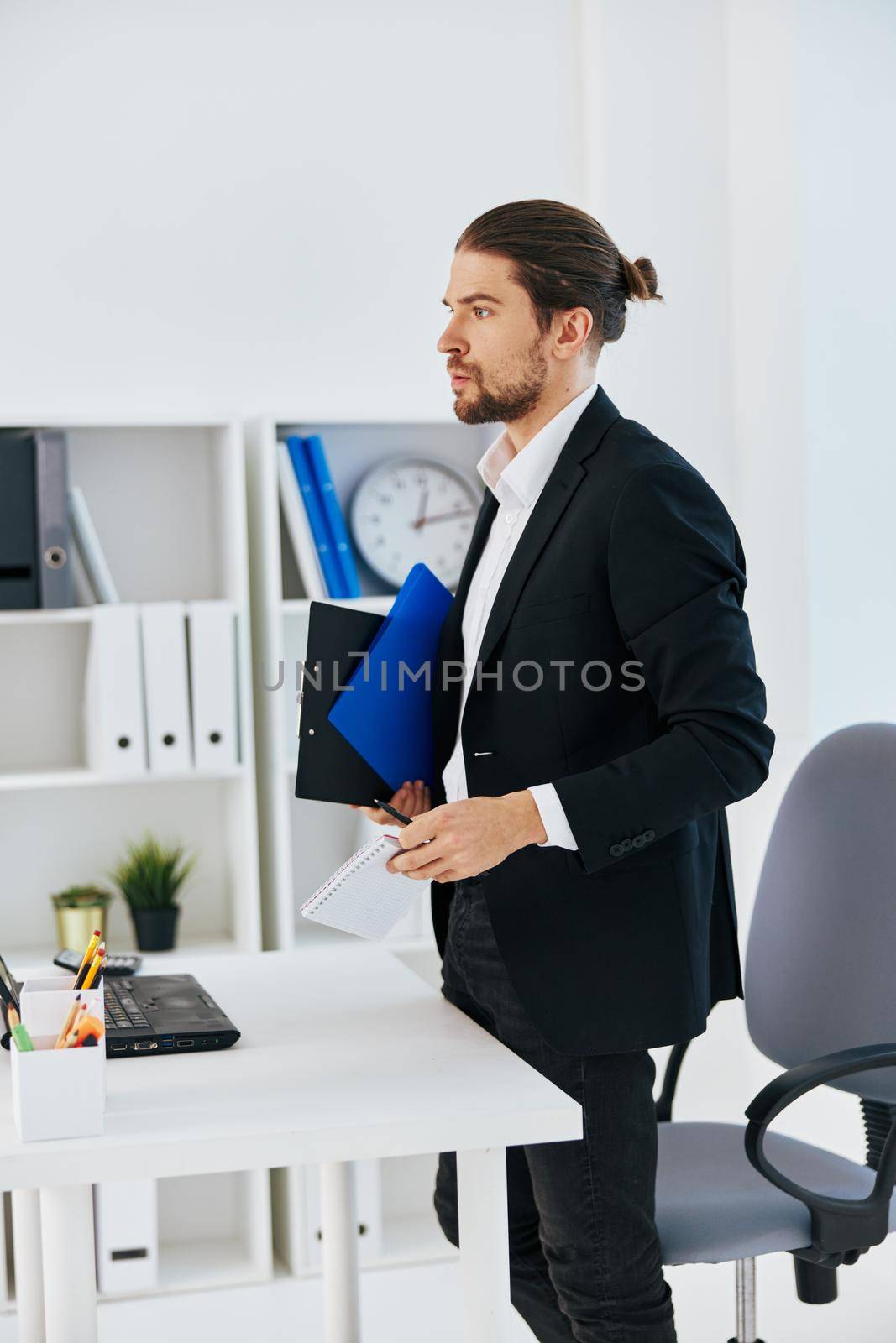 businessmen workflow in the office documents emotions boss. High quality photo