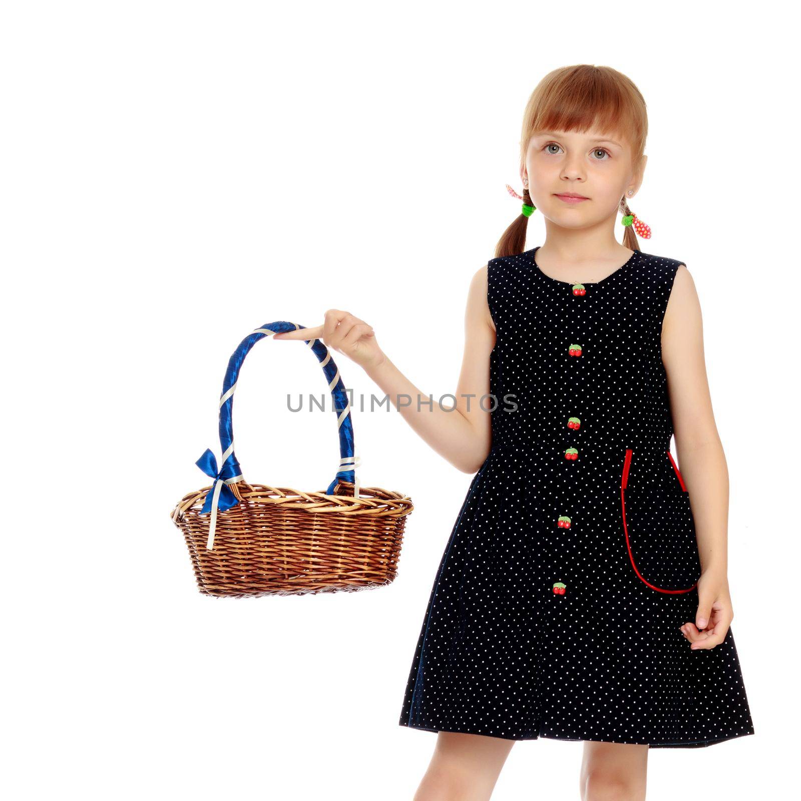 A little girl with a wicker basket made of willow twigs. The concept of family rest, harvesting, picking mushrooms and berries. Isolated over white background