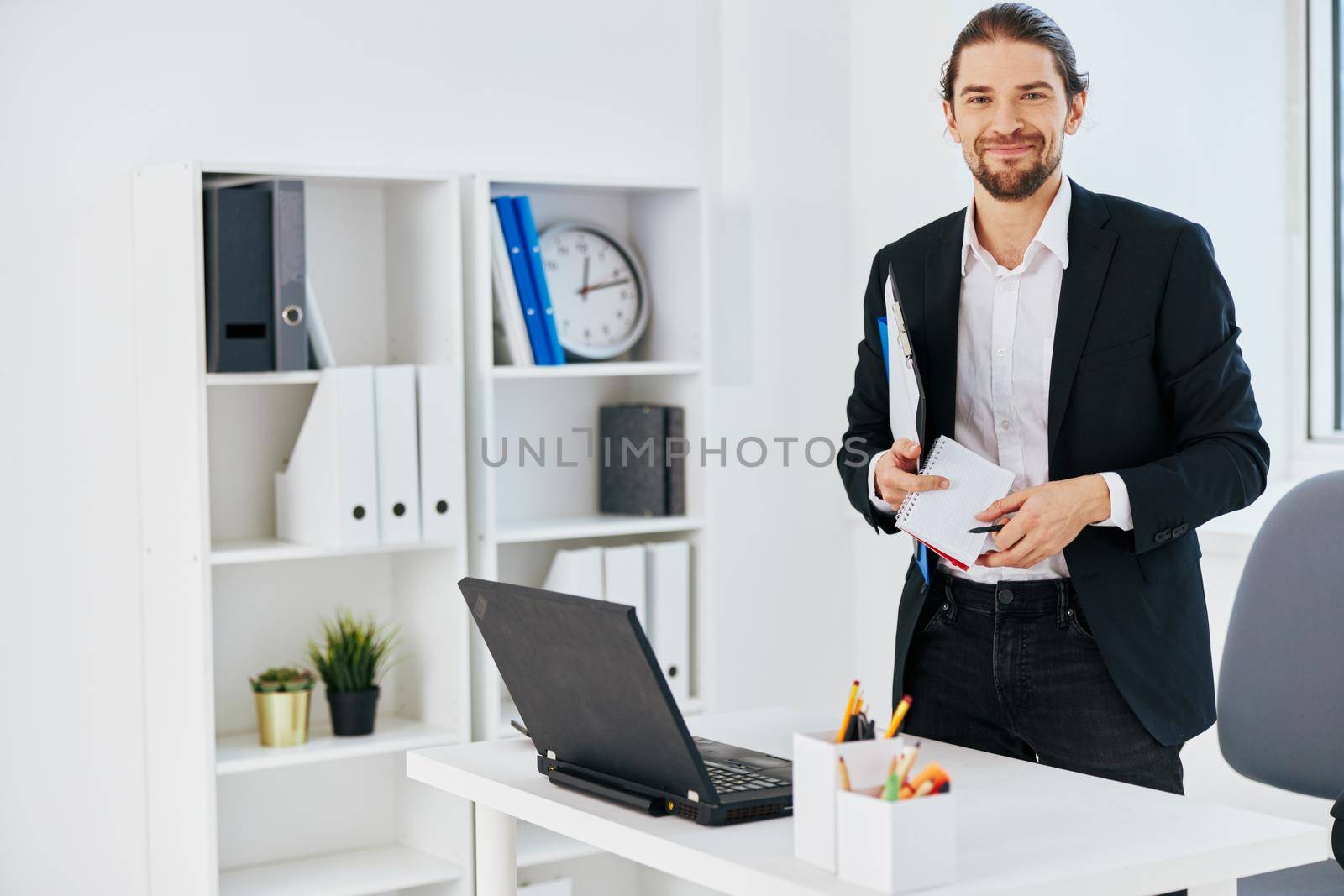 office worker workflow in the office documents emotions technology. High quality photo