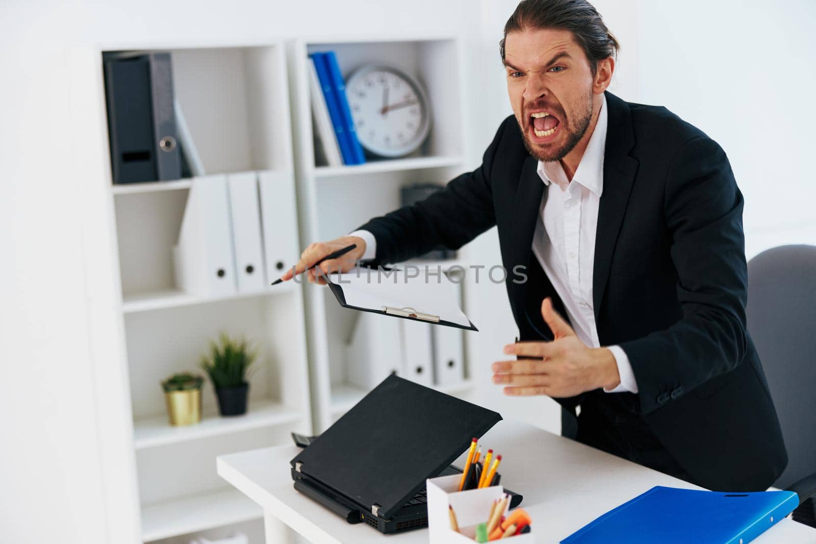businessmen emotions work office desk Lifestyle. High quality photo
