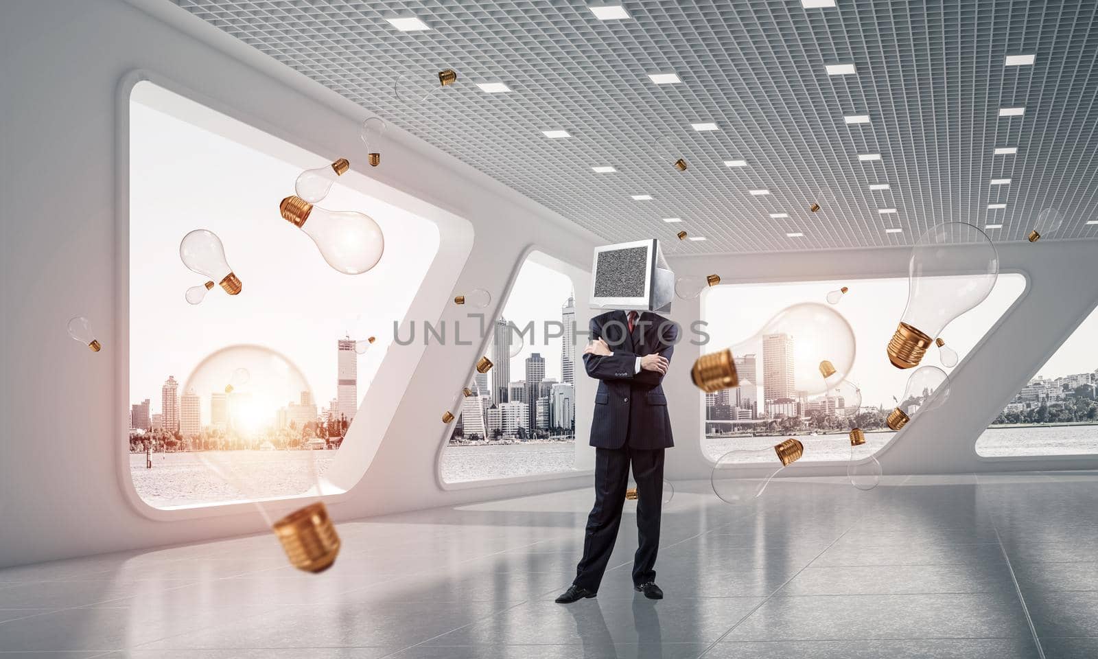 Businessman in suit with monitor instead of head keeping arms crossed while standing among flying and glowing lightbulbs inside office building. 3D rendering.