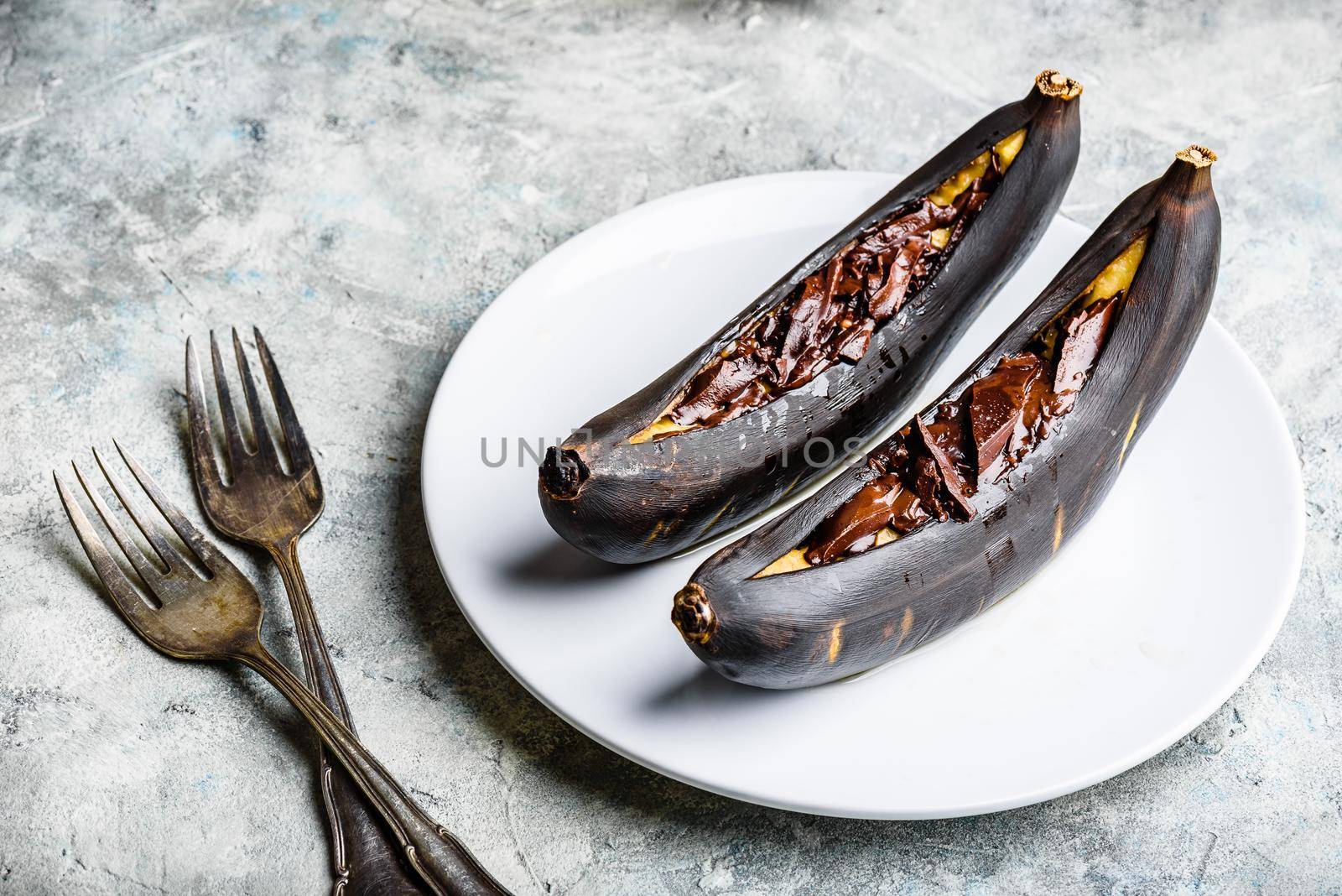 Grilled bananas with dark chocolate by Seva_blsv